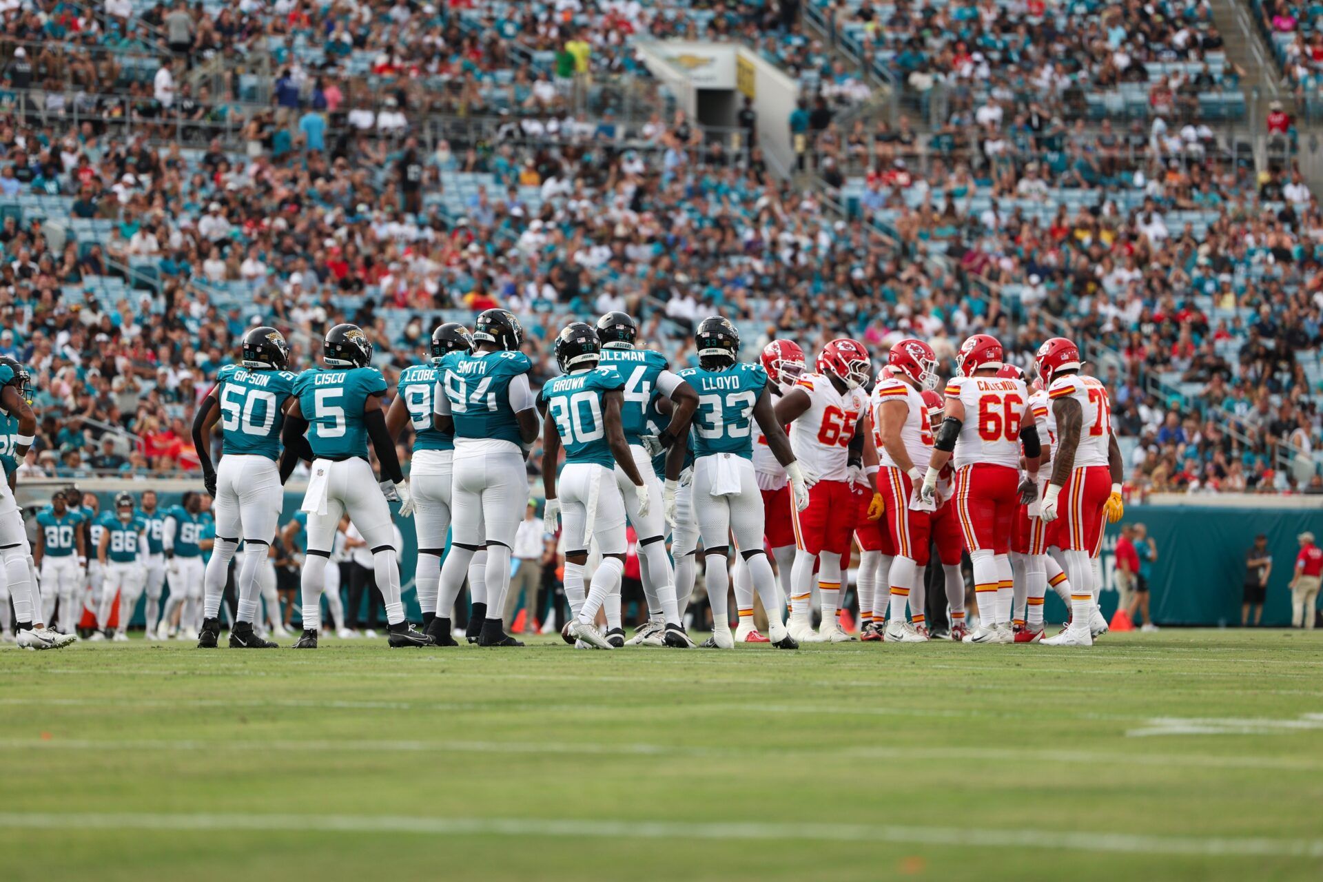Jacksonville Jaguars and the Kansas City Chiefs huddled in the first quarter during preseason at EverBank Stadium.