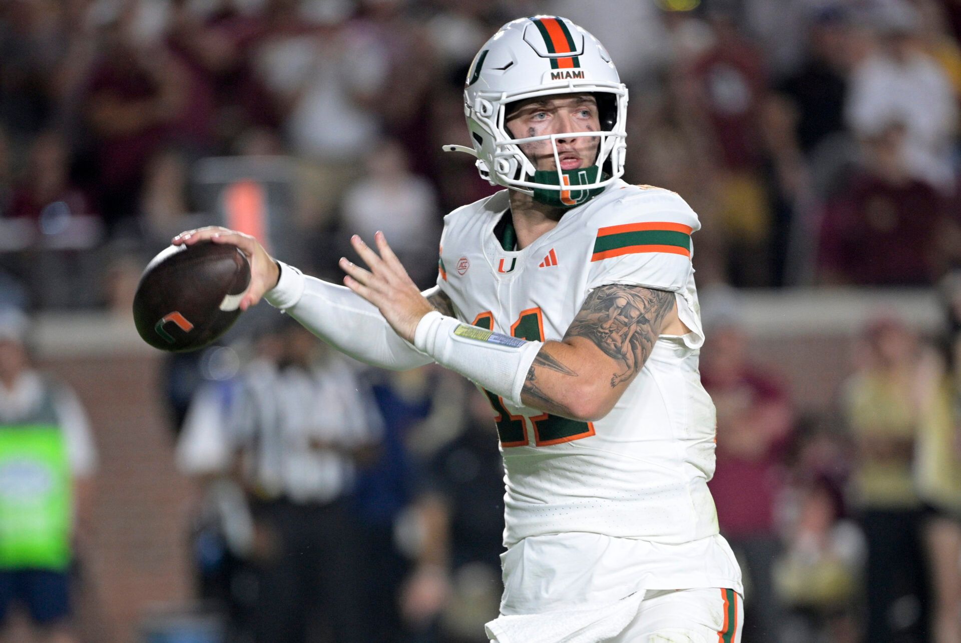 Miami Hurricanes quarterback Carson Beck (11) throws during the second half against the Florida State Seminoles at Doak S. Campbell Stadium.