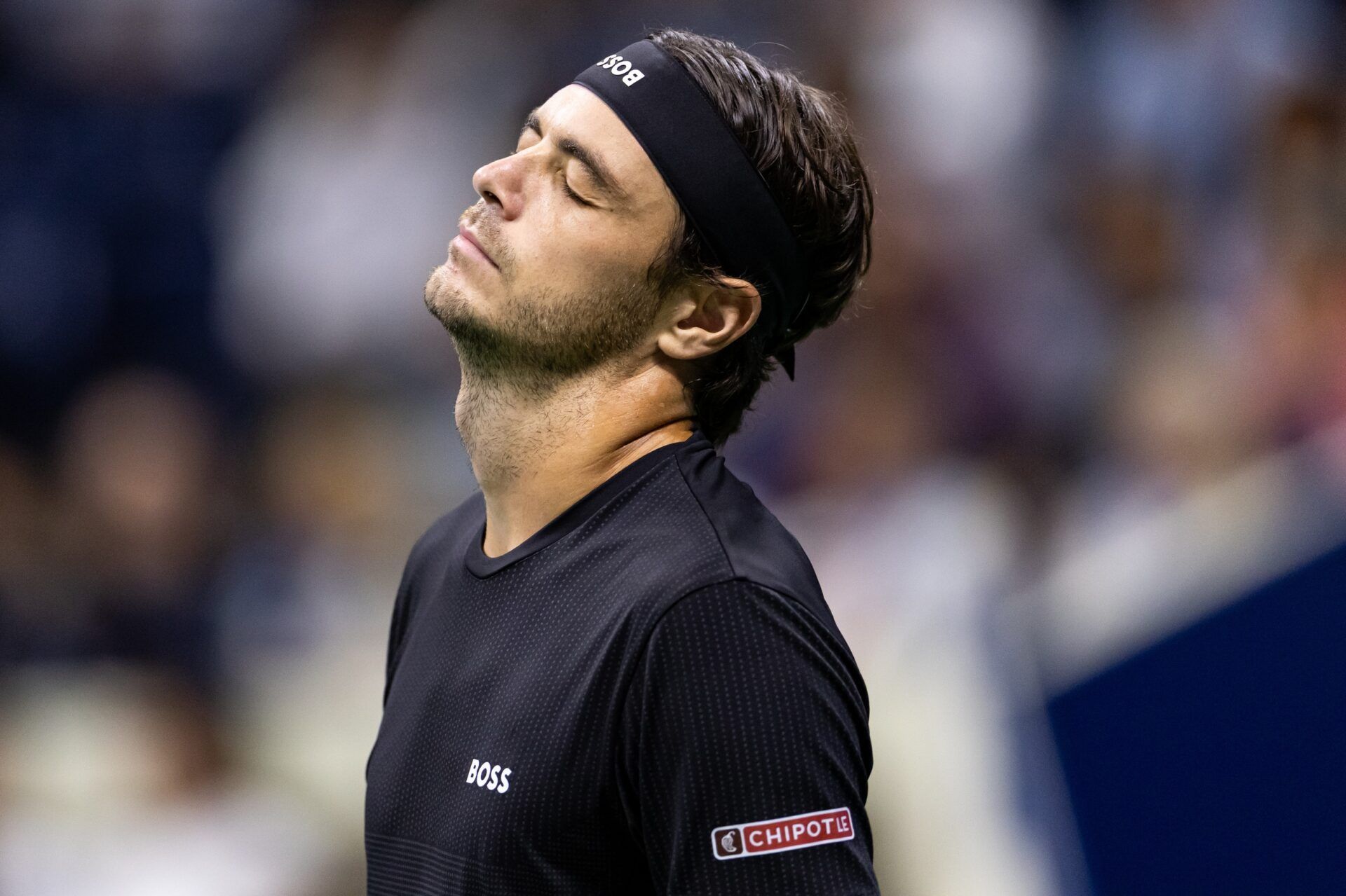 Taylor Fritz of the United States in action against Novak Djokovic of Serbia in the quarterfinal of the men’s singles at the US Open at Arthur Ashe Stadium in Billie Jean King National Tennis Center.
