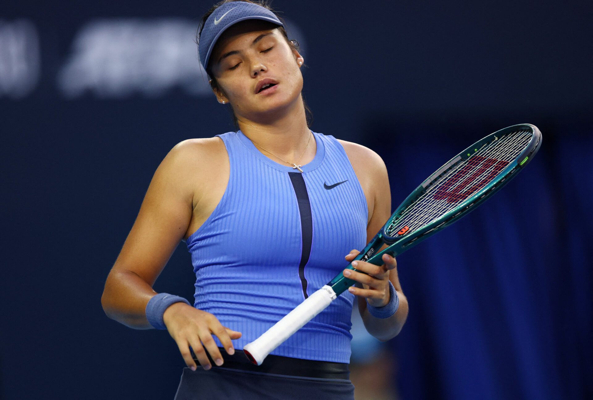 Tennis - China Open - The Beijing Olympic Green Tennis Center, Beijing, China - September 29, 2025 Britain's Emma Raducanu reacts during her round of 32 match against Jessica Pegula of the U.S. REUTERS/Tingshu Wang