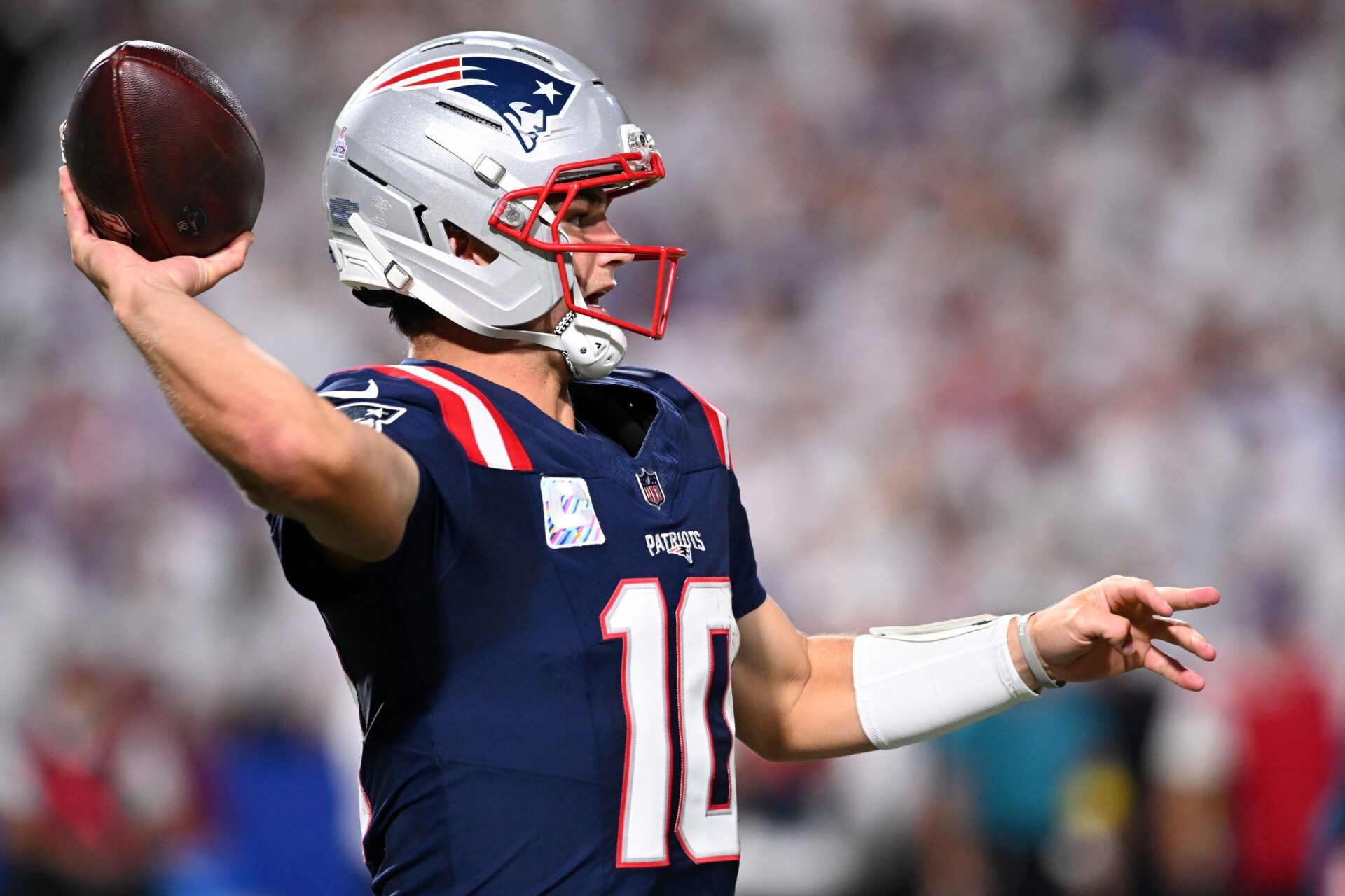 New England Patriots quarterback Drake Maye (10) drops back to pass against the Buffalo Bills during the second half at Highmark Stadium.