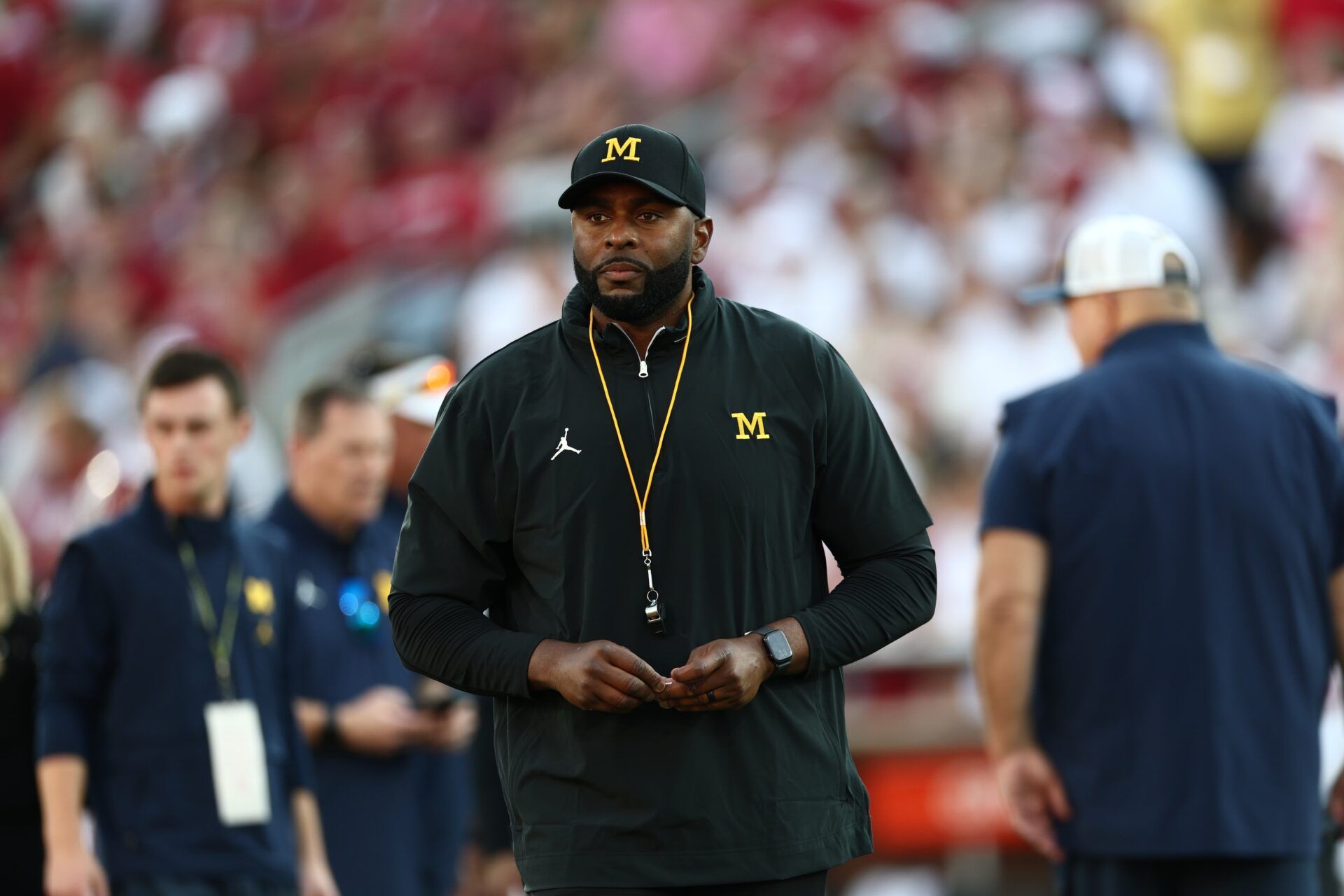 Michigan Wolverines head coach Sherrone Moore stands on the sideline prior to a game against the Oklahoma Sooners at Gaylord Family-Oklahoma Memorial Stadium.