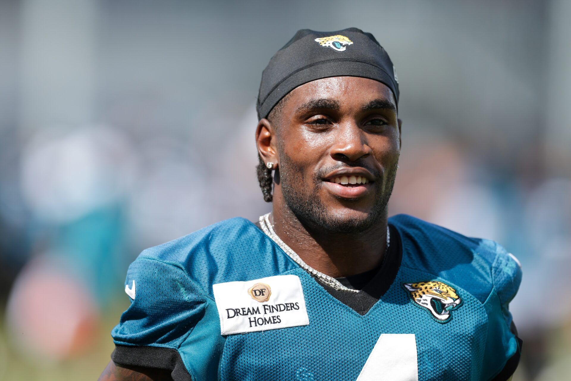 Jacksonville Jaguars running back Tank Bigsby (4) participates in training camp at Miller Electric Center.
