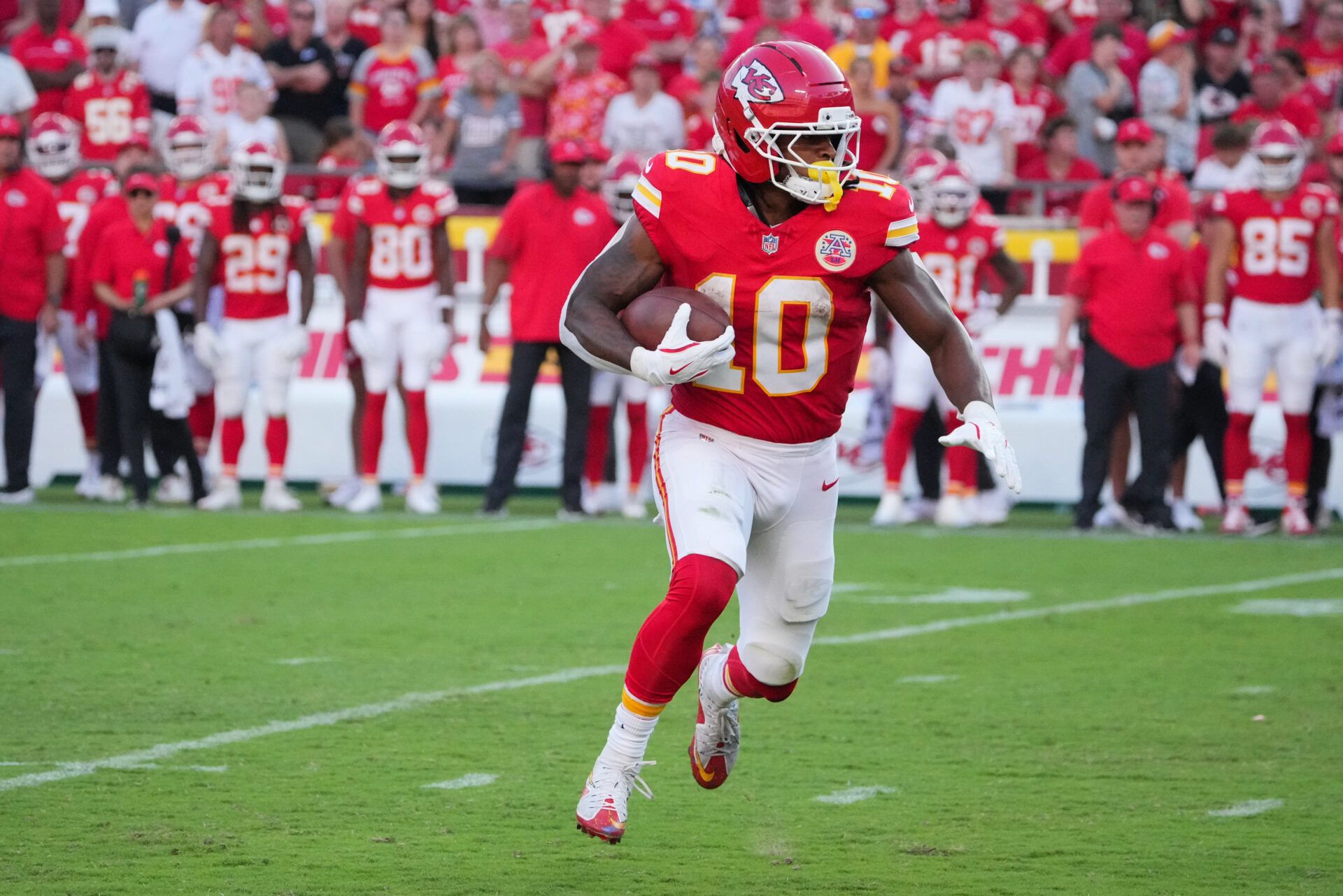 Kansas City Chiefs running back Isiah Pacheco (10) runs with the ball during the fourth quarter against the Baltimore Ravens at GEHA Field at Arrowhead Stadium.
