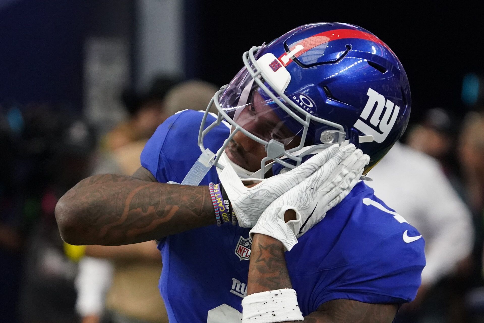 New York Giants wide receiver Malik Nabers (1) reacts after scoring a touchdown during the fourth quarter at AT&T Stadium.