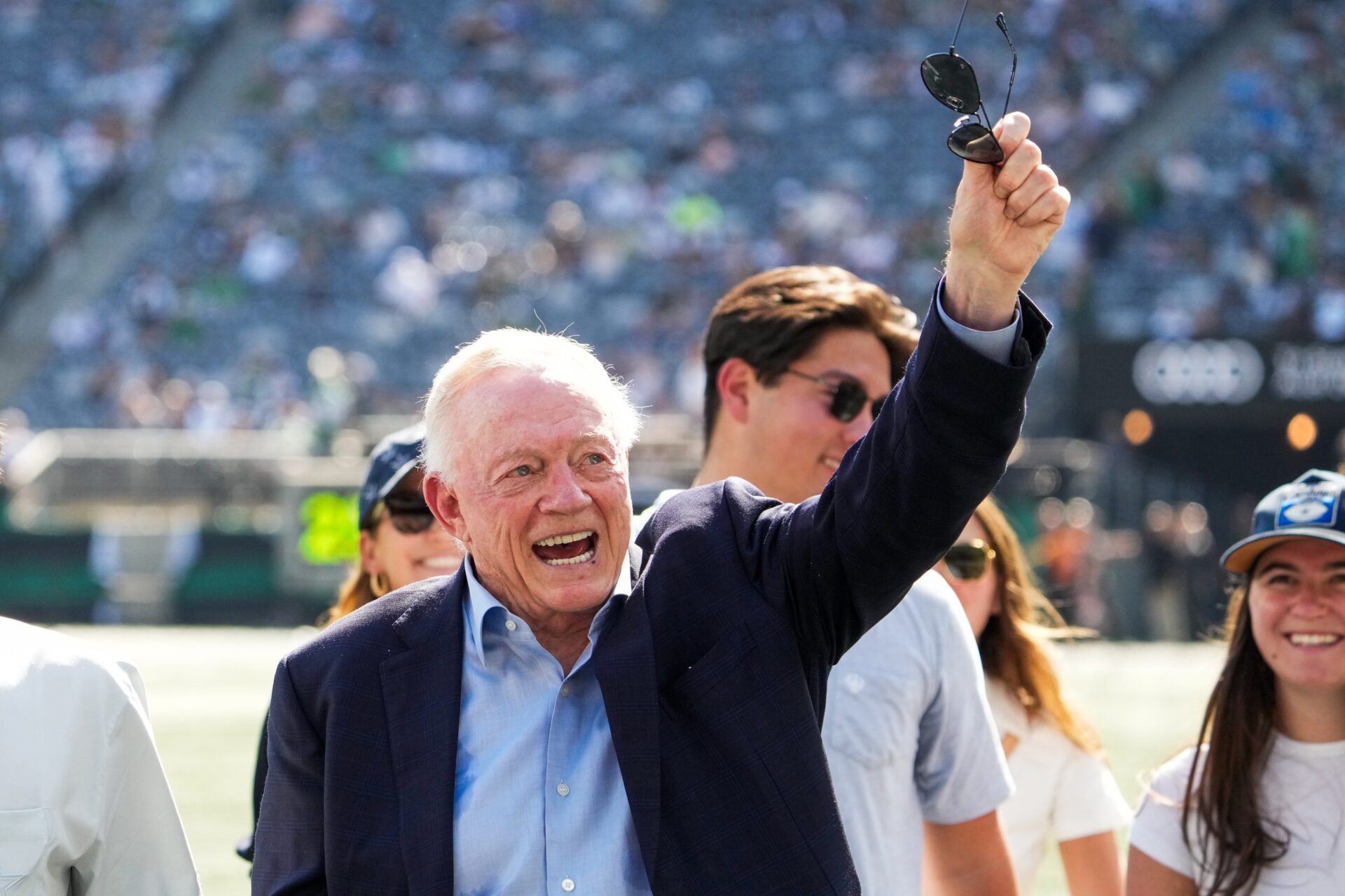 Dallas Cowboys Owner, President and general manager Jerry Jones waves on the field prior to a game against the New York Jets  at MetLife Stadium.