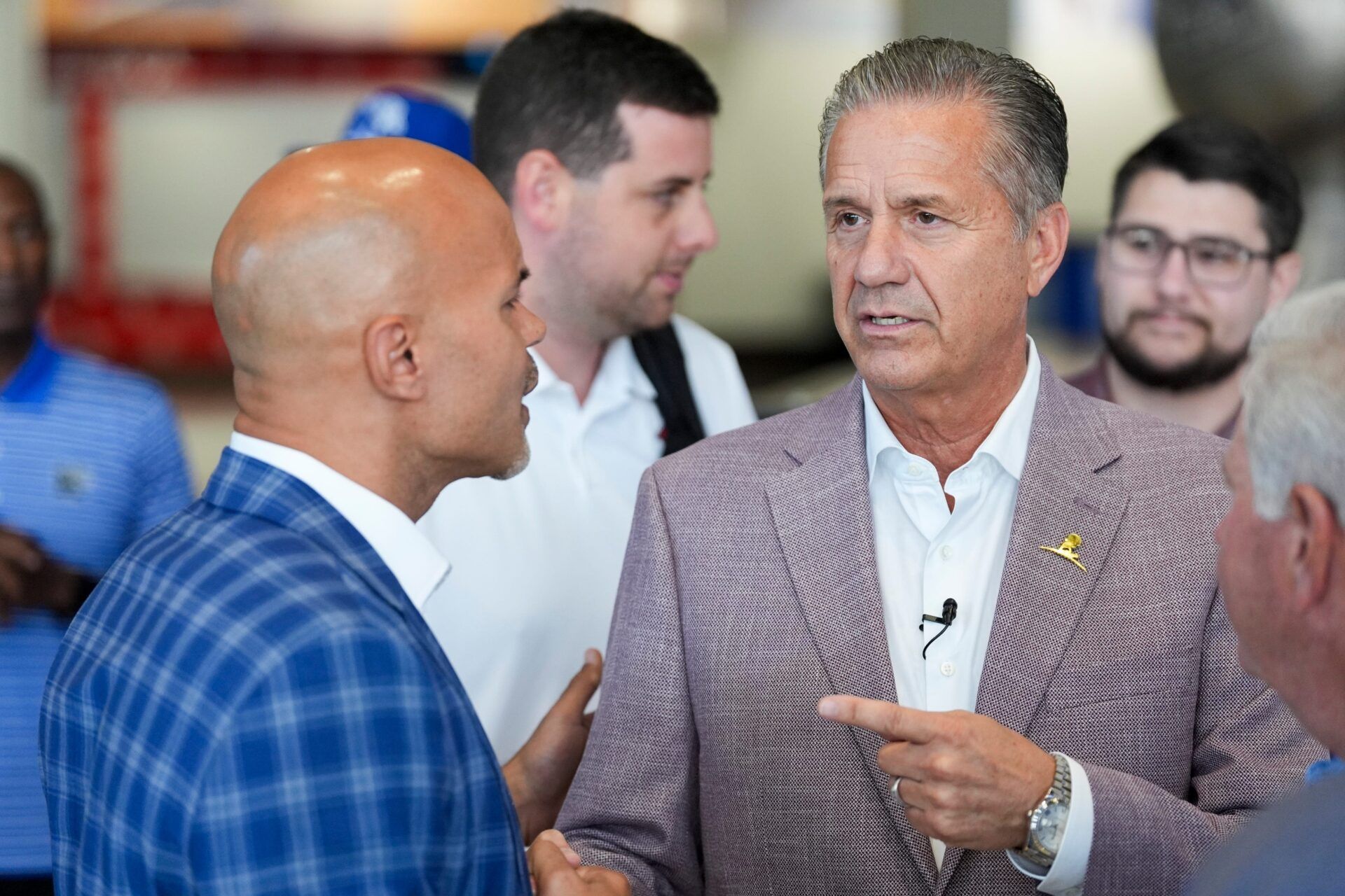 Ed Scott, the University of Memphis athletic director, and Arkansas men’s basketball head coach John Calipari speak with each other after a press conference for the Hoops for St. Jude Tip Off Classic at FedExForum on September 2, 2025.