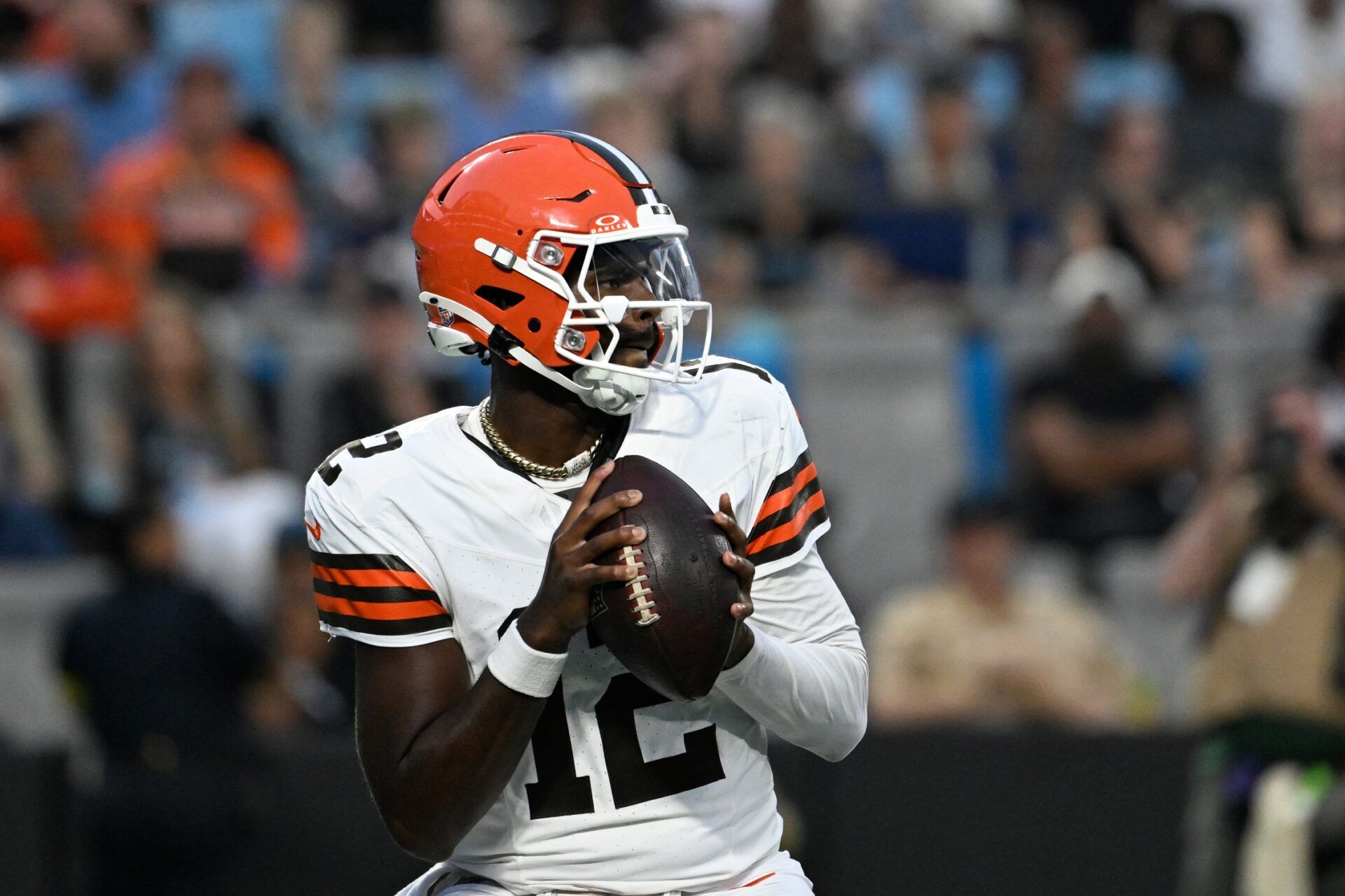 Cleveland Browns quarterback Shedeur Sanders (12) looks to pass in the second quarter at Bank of America Stadium.
