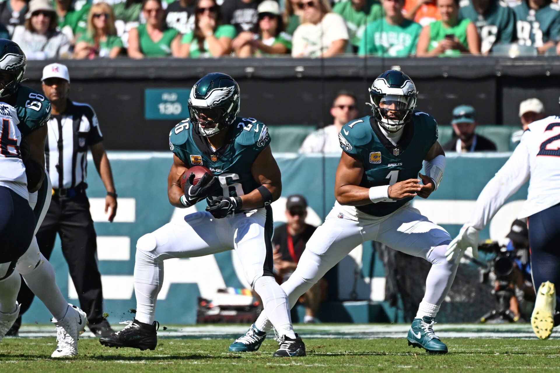 Philadelphia Eagles running back Saquon Barkley (26) looks for room to run during the first quarter against the Denver Broncos at Lincoln Financial Field.