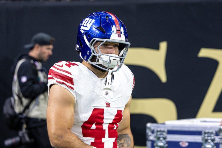 New York Giants running back Cam Skattebo (44) runs out the tunnel against New Orleans Saints during warmups at Caesars Superdome.