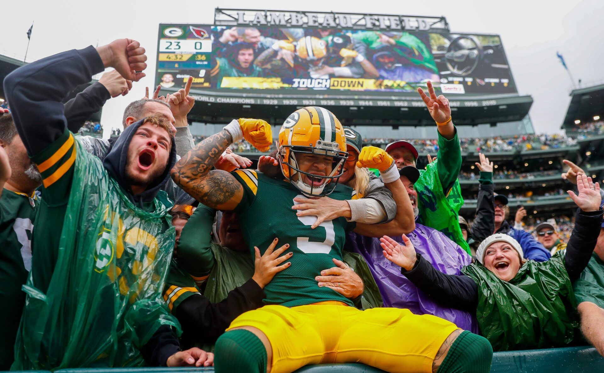 Green Bay Packers wide receiver Christian Watson (9) flexes as he does a “Lambeau Leap” with Packers fans after scoring a touchdown against the Arizona Cardinals on Sunday, October 13, 2024, at Lambeau Field in Green Bay, Wis. The Packers won the game, 34-13
Tork Mason/USA TODAY NETWORK-Wisconsin