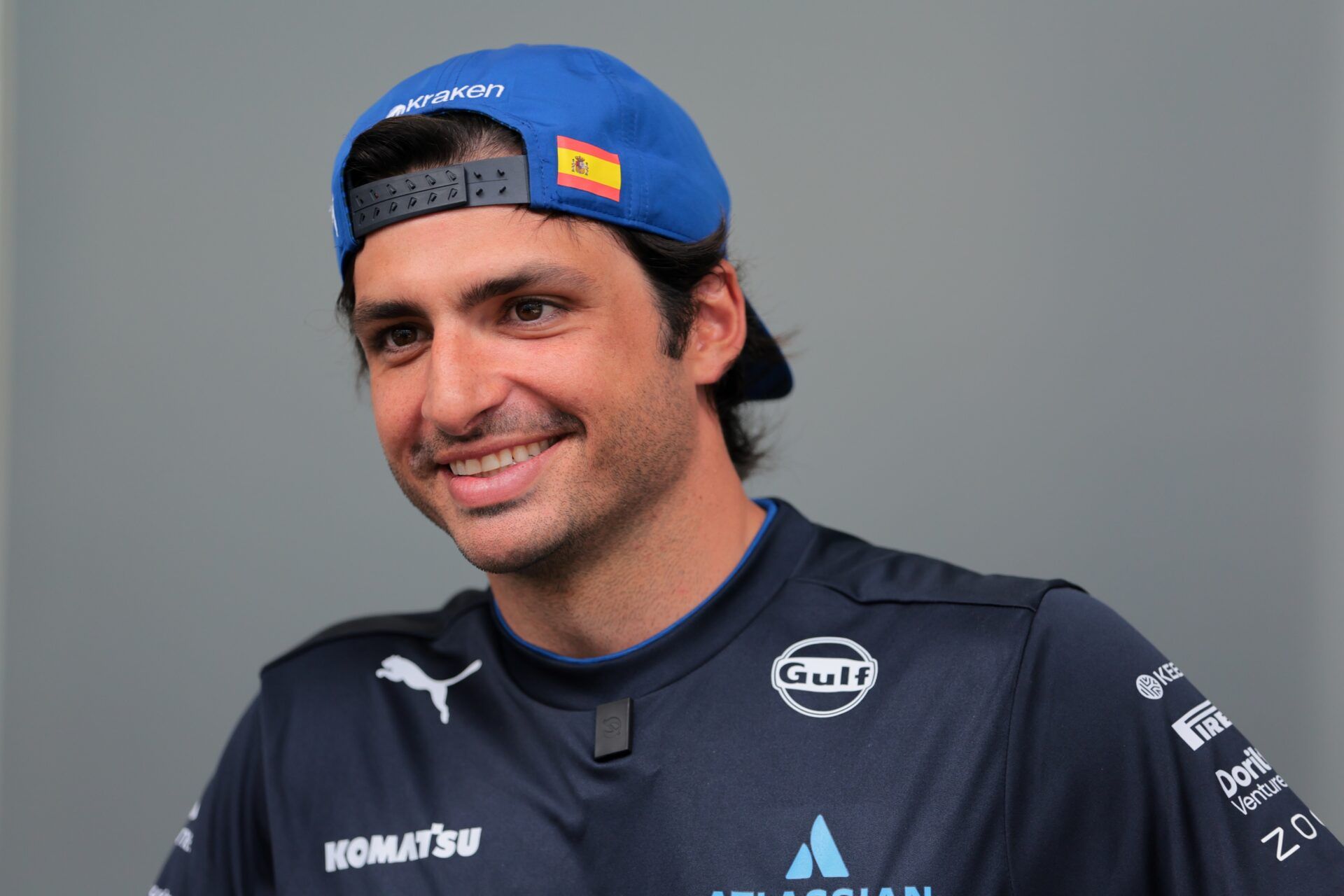 Williams driver Carlos Sainz (55) looks on from the paddock at Miami International Autodrome.