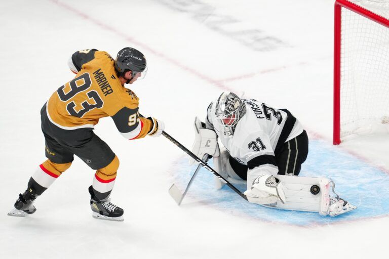 Los Angeles Kings goaltender Anton Forsberg (31) makes a save against Vegas Golden Knights right wing Mitch Marner (93) during a shoot-out at T-Mobile Arena.