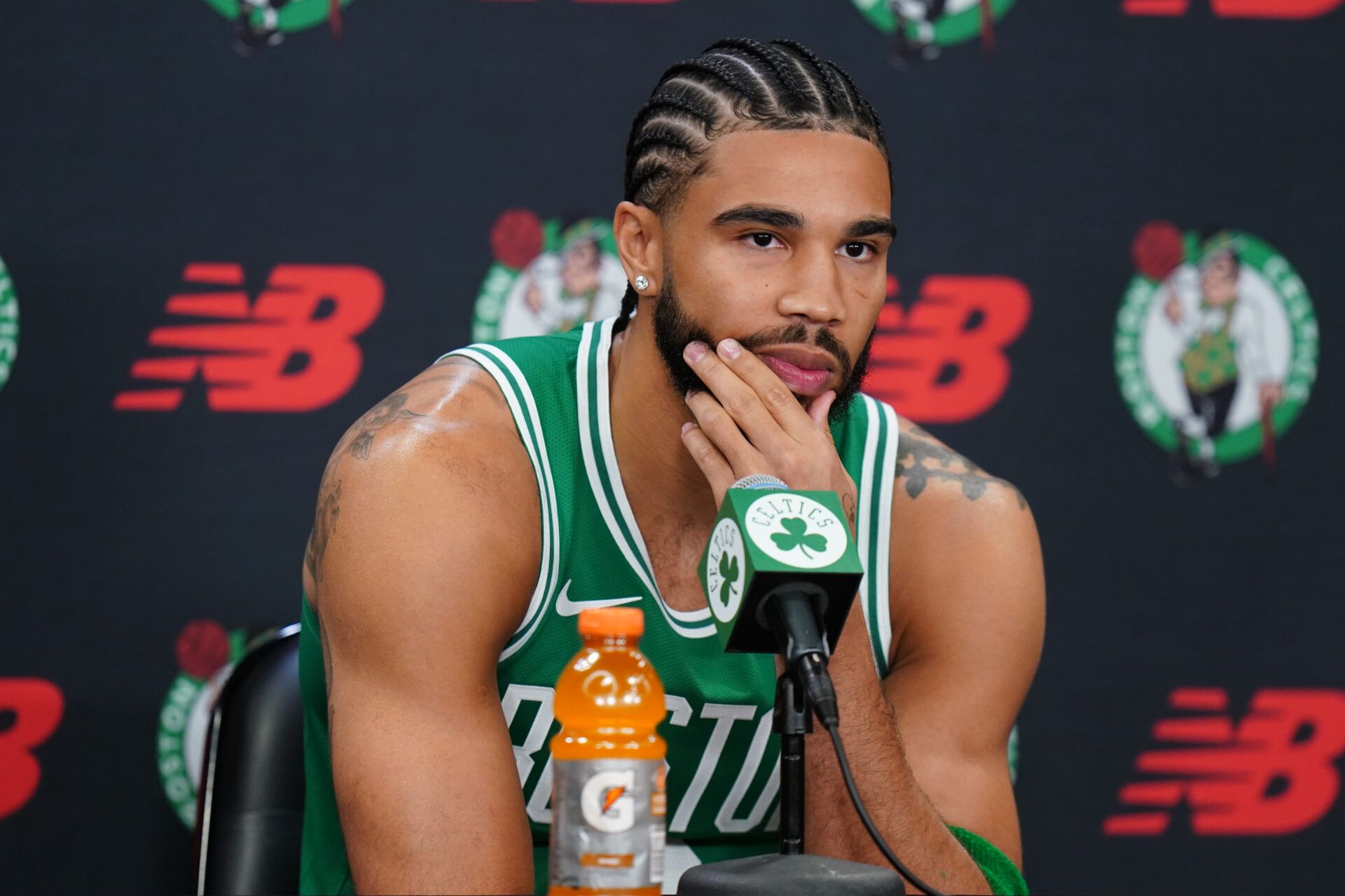 Boston Celtics forward Jayson Tatum (0) talks with reporters during media day at the Auerbach Center.