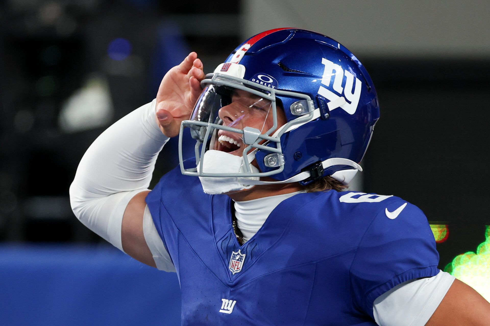 New York Giants quarterback Jaxson Dart (6) celebrates after scoring a touchdown against the Philadelphia Eagles of the game at MetLife Stadium.
