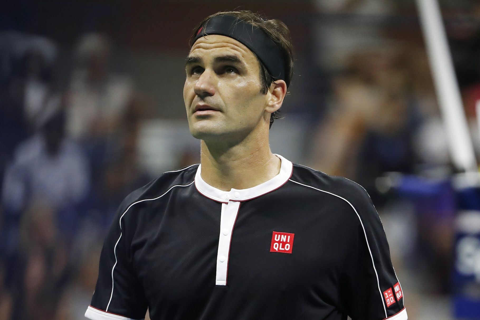 Roger Federer of Switzerland looks at the board between points against Grigor Dimitrov of Bulgaria (not pictured) in a quarterfinal match on day nine of the 2019 US Open tennis tournament at USTA Billie Jean King National Tennis Center.