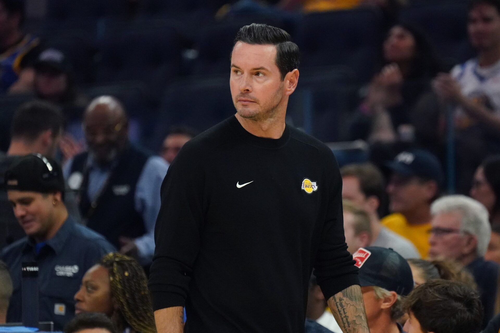 Los Angeles Lakers head coach JJ Redick watches the action against the Golden State Warriors in the first quarter at Chase Center.