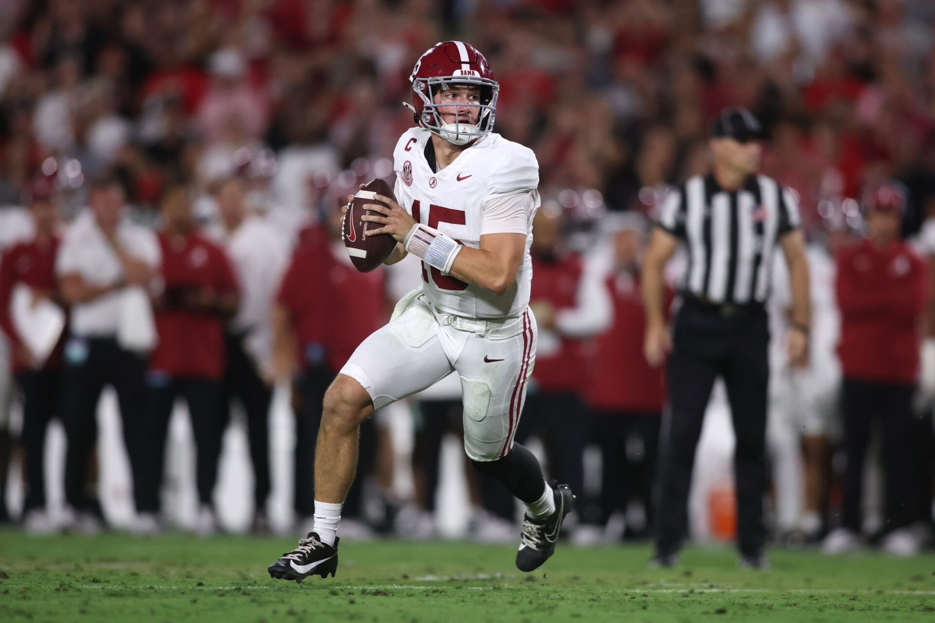 Alabama Crimson Tide quarterback Ty Simpson (15) looks to pass against the Georgia Bulldogs in the first half at Sanford Stadium.
