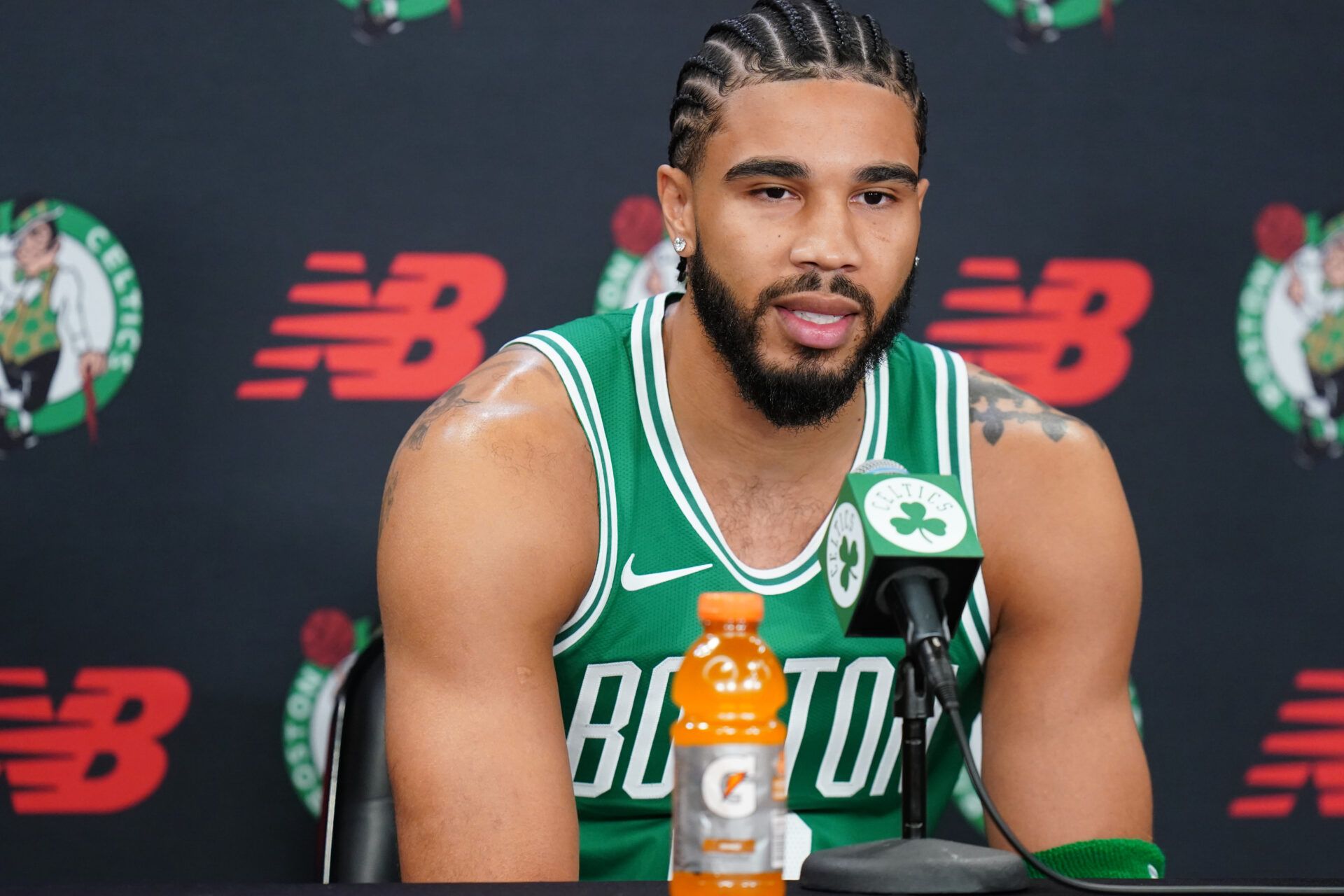 Boston Celtics forward Jayson Tatum (0) talks with reporters during media day at the Auerbach Center.