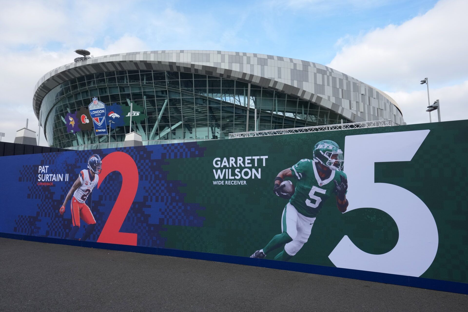 A mural featuring Denver Broncos cornerback Pat Surtain II (2) and New York Jets wide receiver Garrett Wilson (5) at Tottenham Hotspur Stadium.