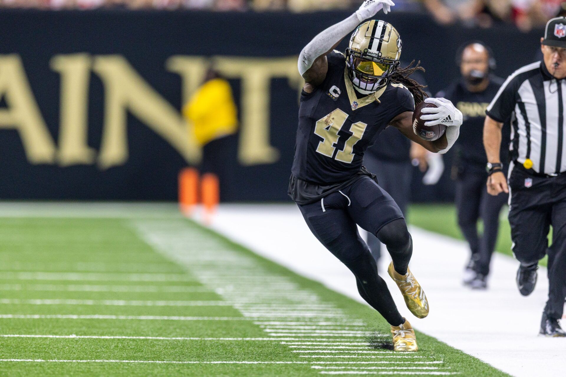 New Orleans Saints running back Alvin Kamara (41) runs against the San Francisco 49ers during the first half at Caesars Superdome.