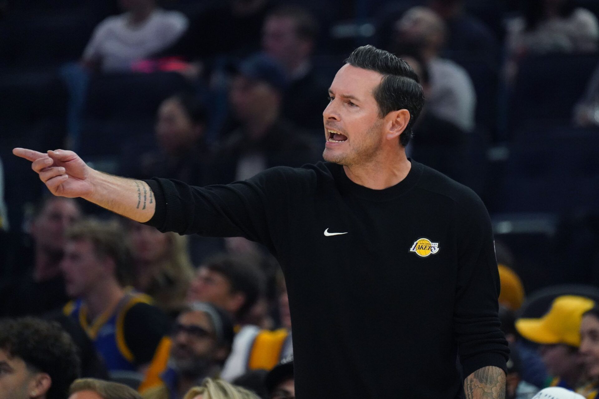 Los Angeles Lakers head coach JJ Redick coaches his team against the Golden State Warriors in the first quarter at Chase Center.
