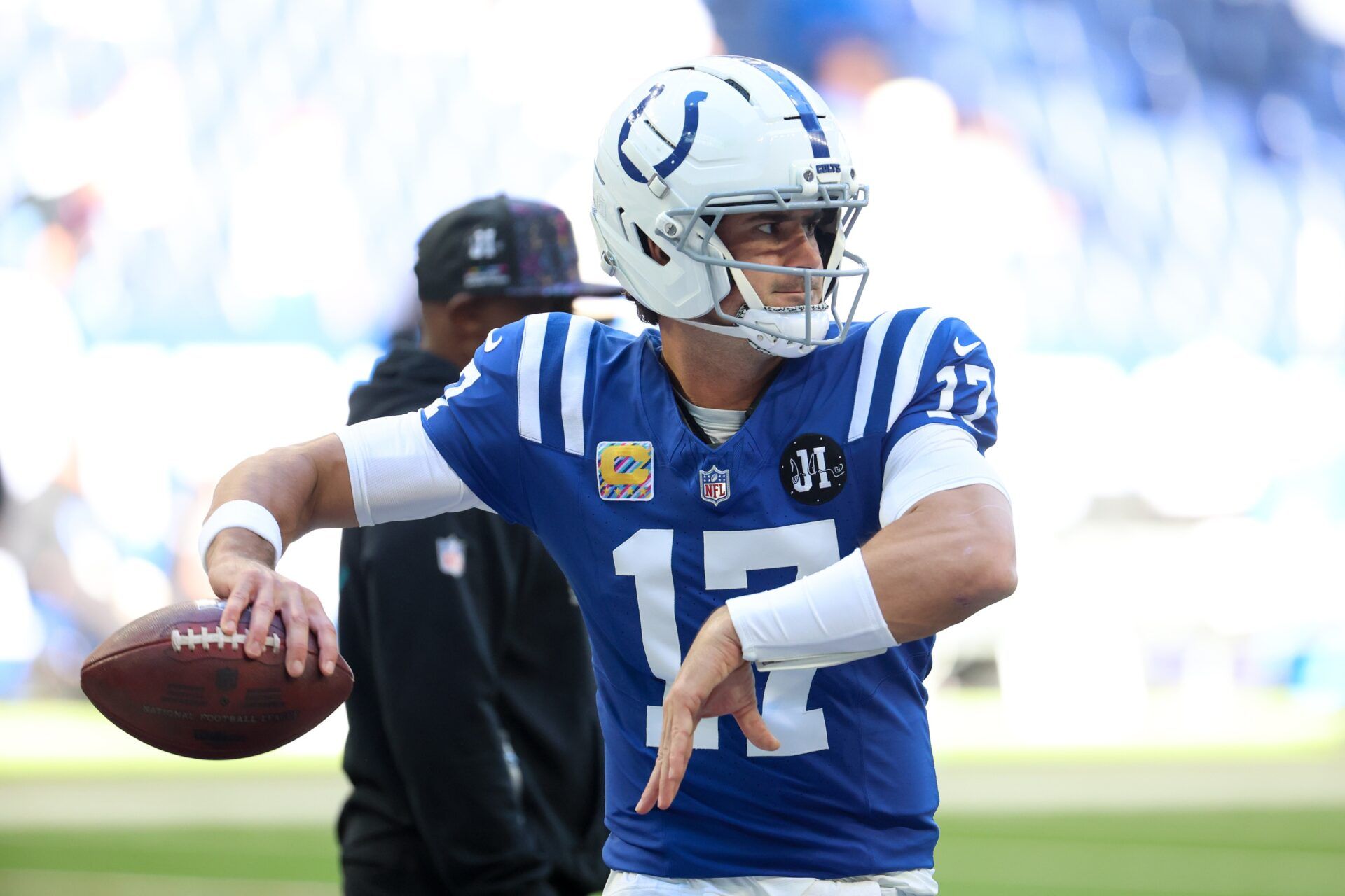 Indianapolis Colts quarterback Daniel Jones (17) warms up prior to the game against the Arizona Cardinals at Lucas Oil Stadium.