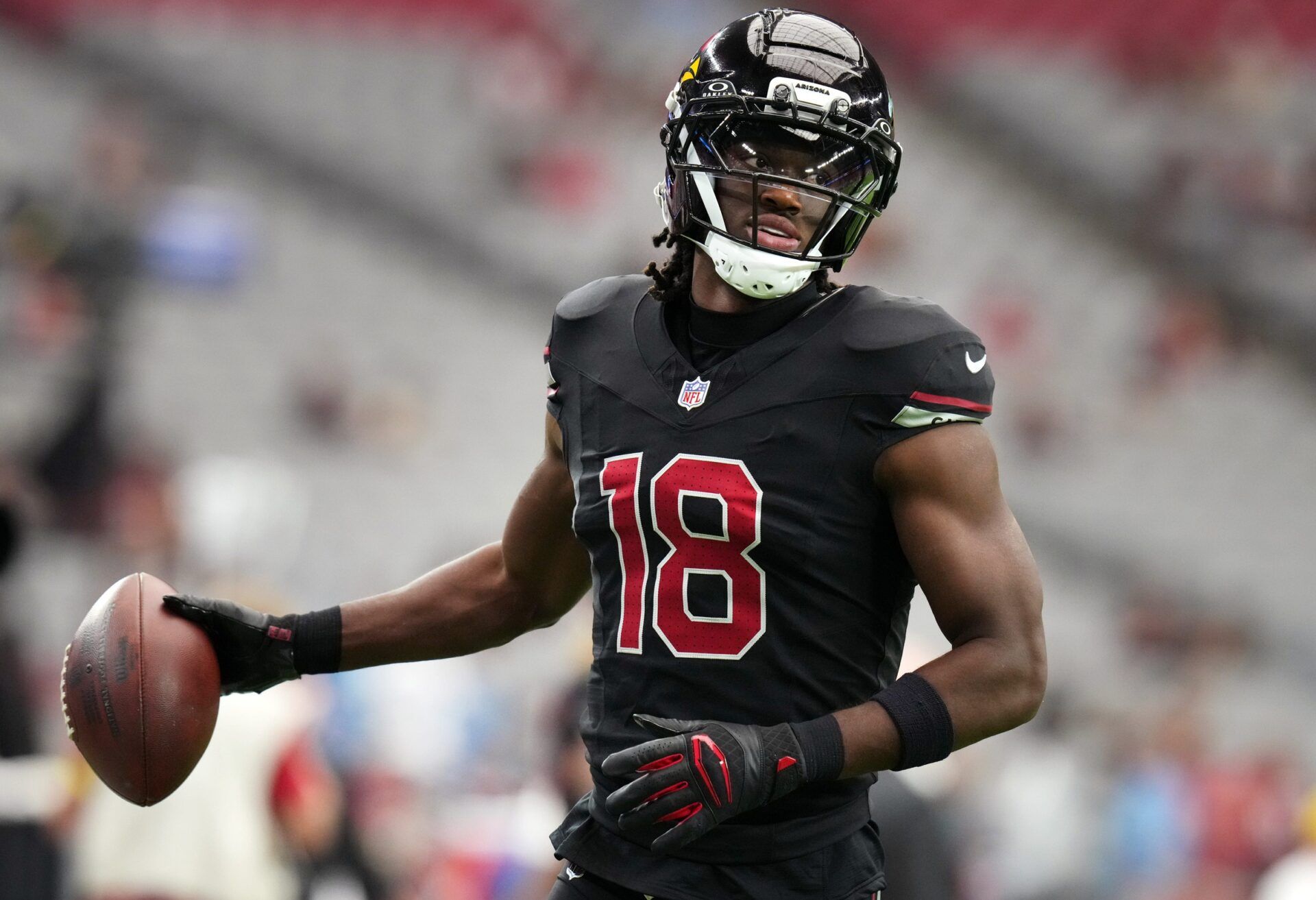 Arizona Cardinals receiver Marvin Harrison Jr. (18) warms up before their game against the Tennessee Titans at State Farm Stadium in Glendale on Oct. 5, 2025.