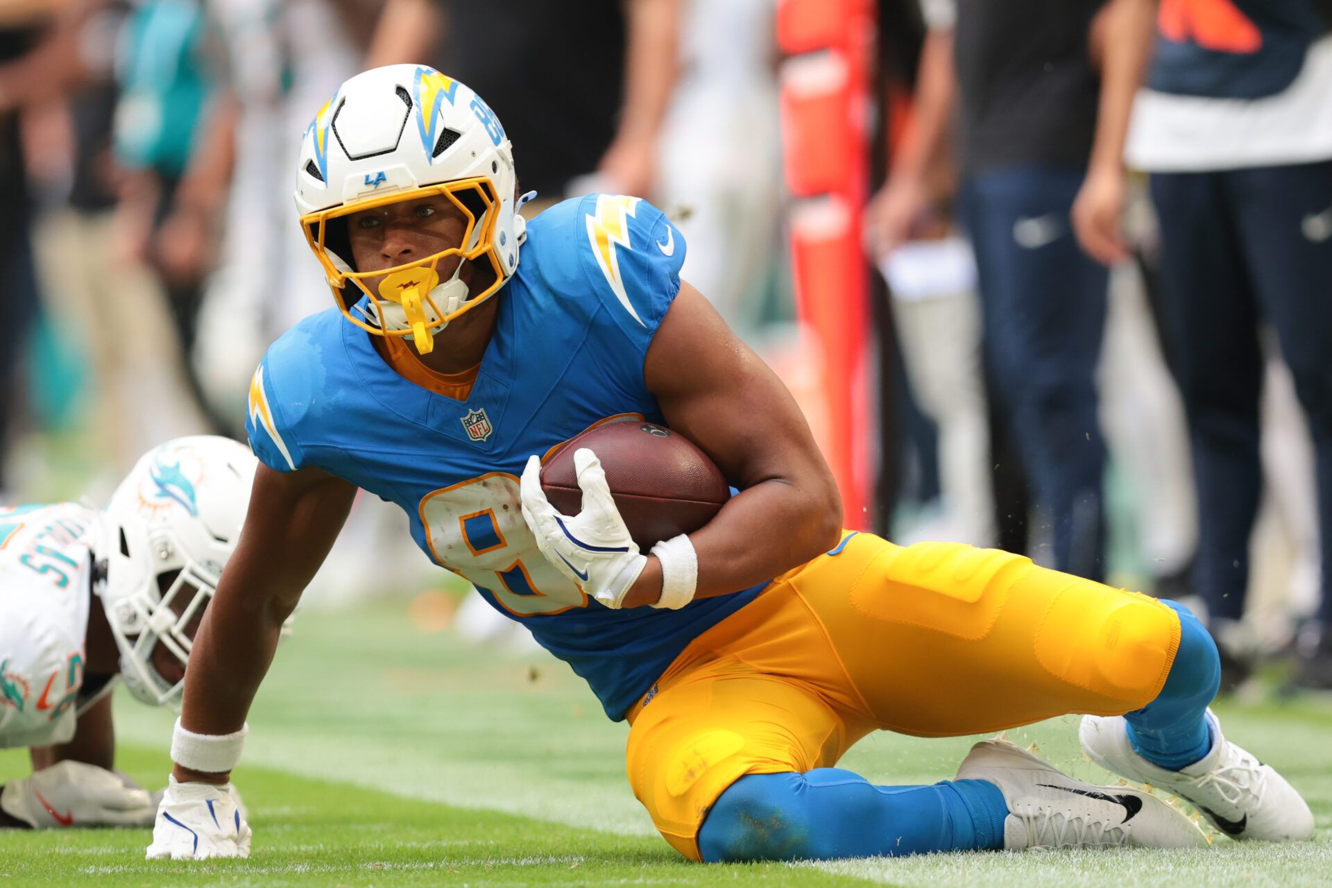Los Angeles Chargers tight end Oronde Gadsden II (86) looks on after carrying the football against the Miami Dolphins during the third quarter at Hard Rock Stadium.