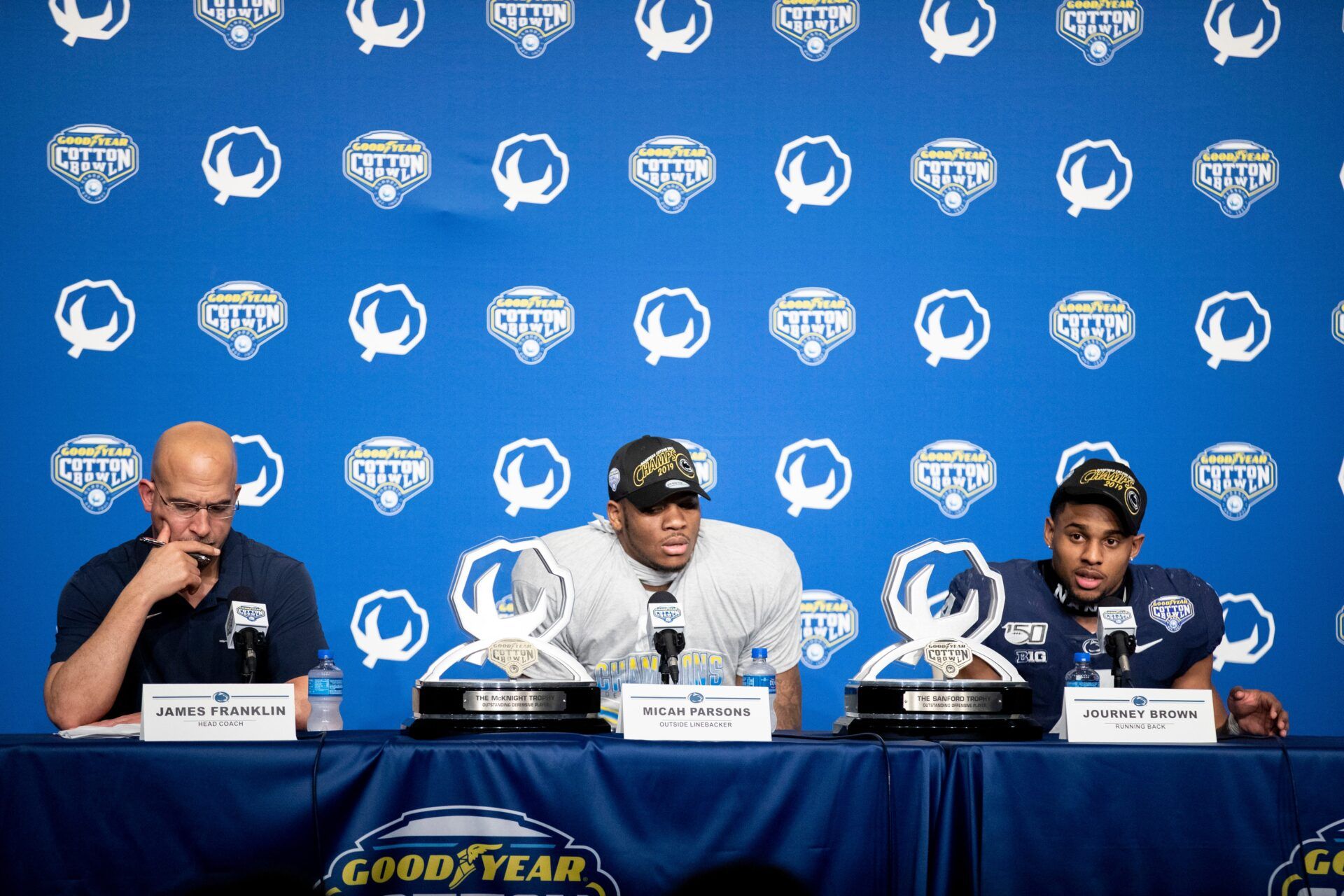 Penn State Head coach James Franklin (from left), outside linebacker Micah Parsons and running back Journey Brown answer questions from the media Saturday, Dec. 28, 2019, after the Goodyear Cotton Bowl Classic at AT&T Stadium in Arlington, Texas.

122819cottonbowlpresser09