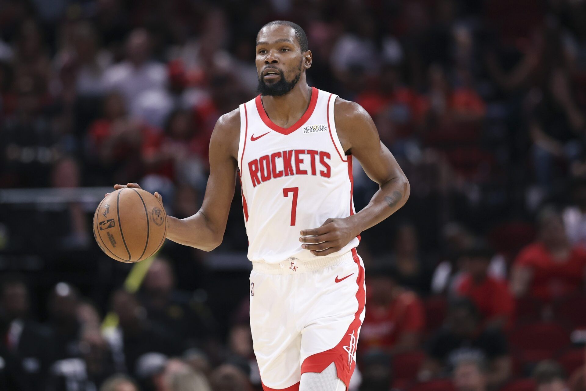 Houston Rockets forward Kevin Durant (7) brings the ball up the court during the third quarter against the Utah Jazz at Toyota Center.