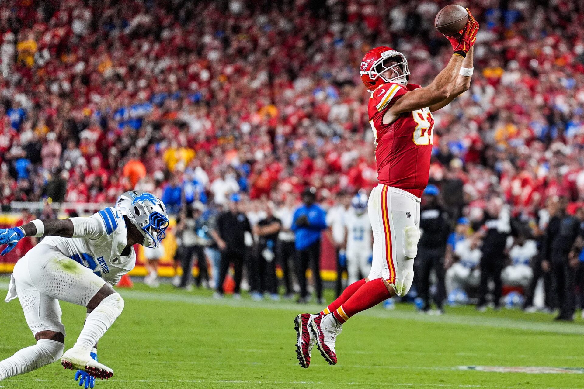 Kansas City Chiefs tight end Travis Kelce (87 makes a catch for a first down against Detroit Lions cornerback Rock Ya-Sin (23) during the second half at Arrowhead Stadium in Kansas City, Missouri on Sunday, Oct. 12, 2025.