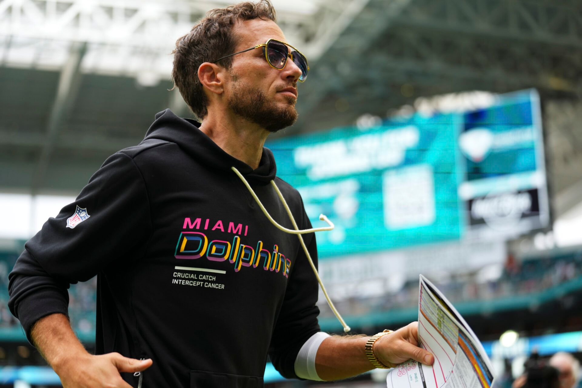Miami Dolphins head coach Mike McDaniel leaves the field at the end of a game against the Los Angeles Chargers at Hard Rock Stadium.