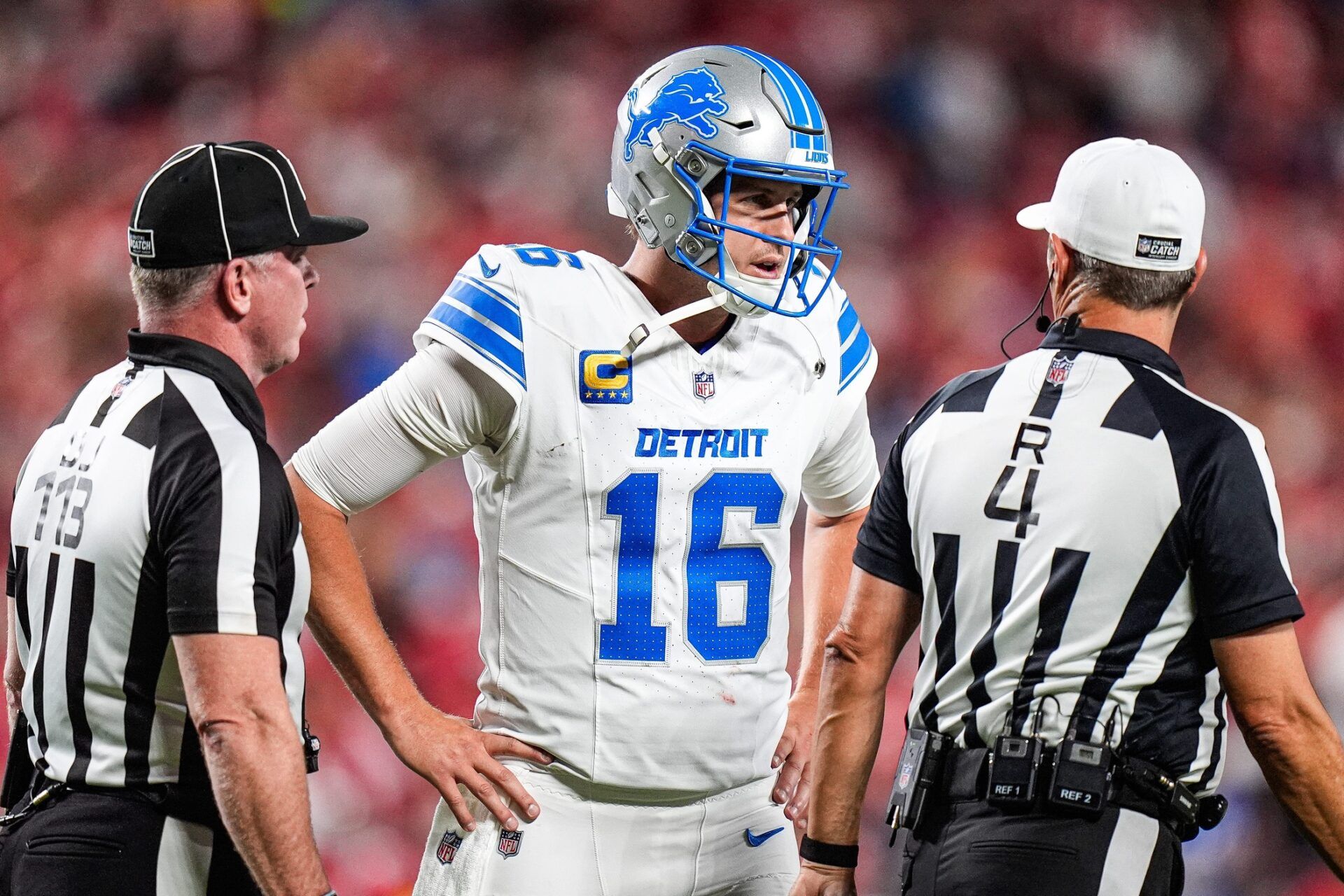 Detroit Lions quarterback Jared Goff (16) talks to referees regarding a call during the first half against Kansas City Chiefs at Arrowhead Stadium in Kansas City, Missouri on Sunday, Oct. 12, 2025.