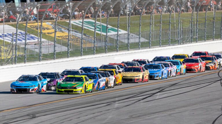 NASCAR Cup Series drivers William Byron (24) and Austin Cindric (2) battle  for the lead late during stage three of the NASCAR: Jack Link's 500 at Talladega Superspeedway.
