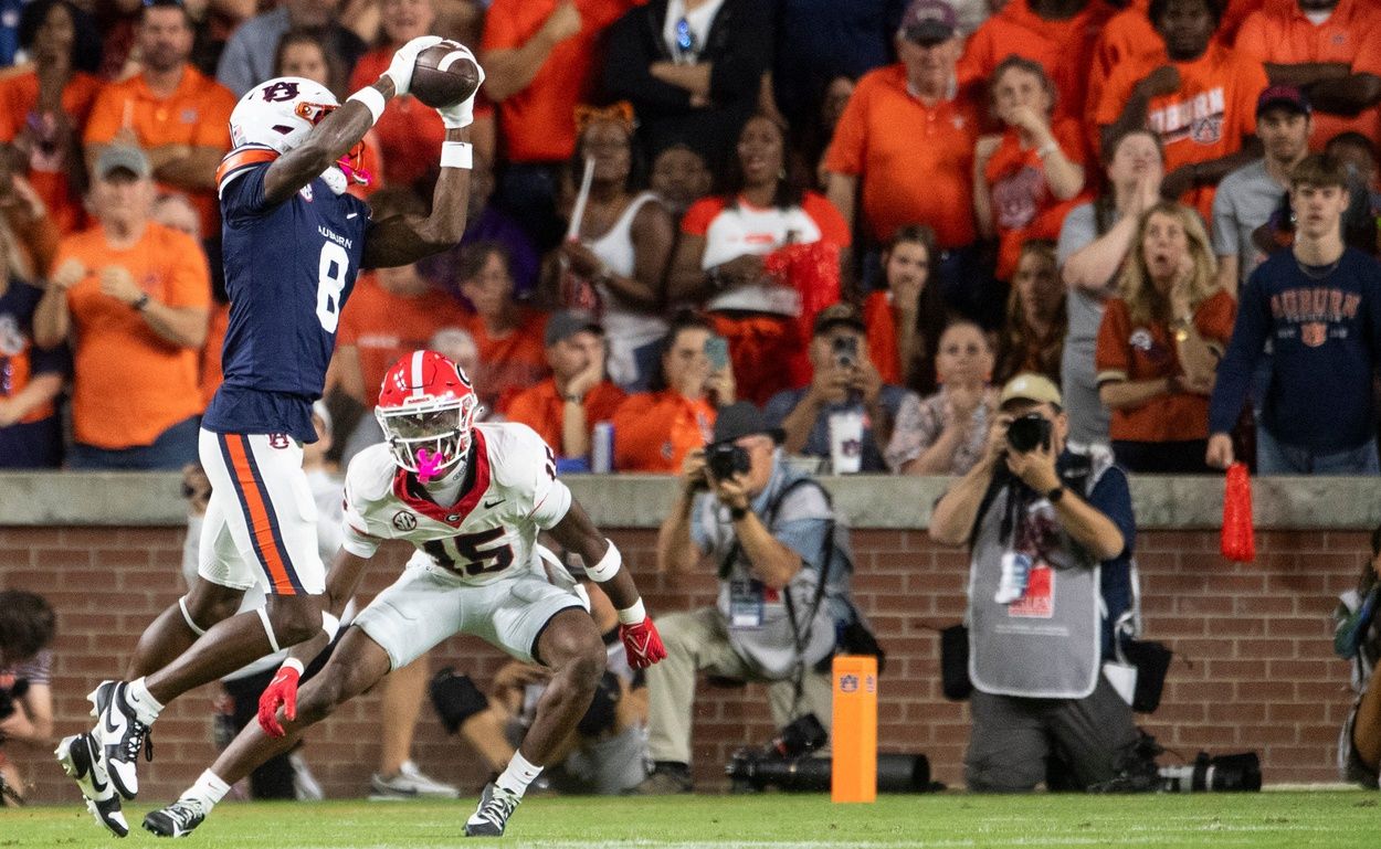 Auburn Tigers wide receiver Cam Coleman (8) catches a pass as Auburn Tigers take on Georgia Bulldogs at Jordan-Hare Stadium in Auburn, Ala. on Saturday, Oct. 11, 2025. Georgia Bulldogs defeated Auburn Tigers 20-10.
