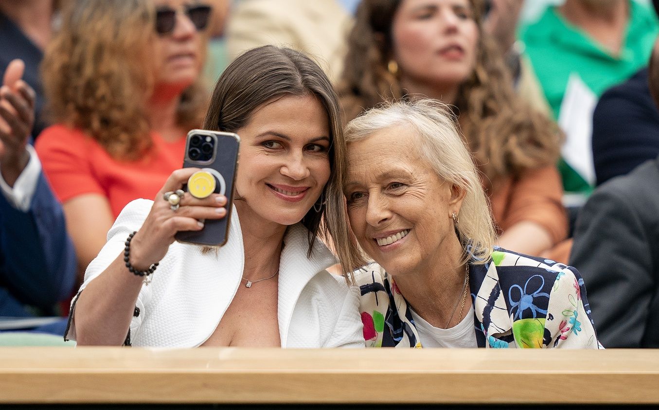 Martina Navratilova and her wife, Julia Lemigova, take a selfie in the Royal Box before the Marketa Vondrousova (CZE) and Ons Jabeur (TUN) womens final match at the All England Lawn Tennis and Croquet Club.