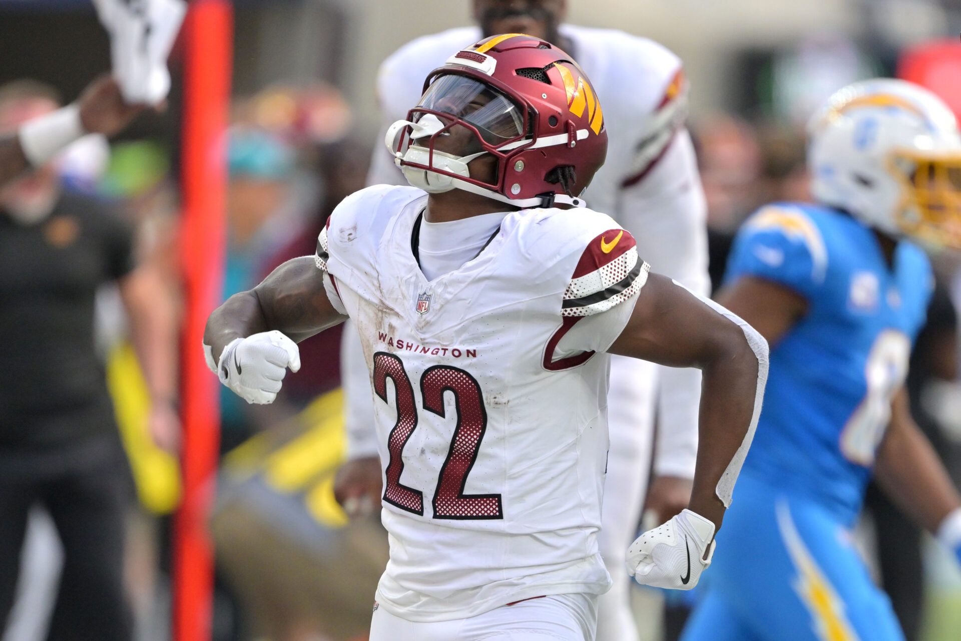 Washington Commanders running back Jacory Croskey-Merritt (22) reacts after a first down against the Los Angeles Chargers in the second half at SoFi Stadium.