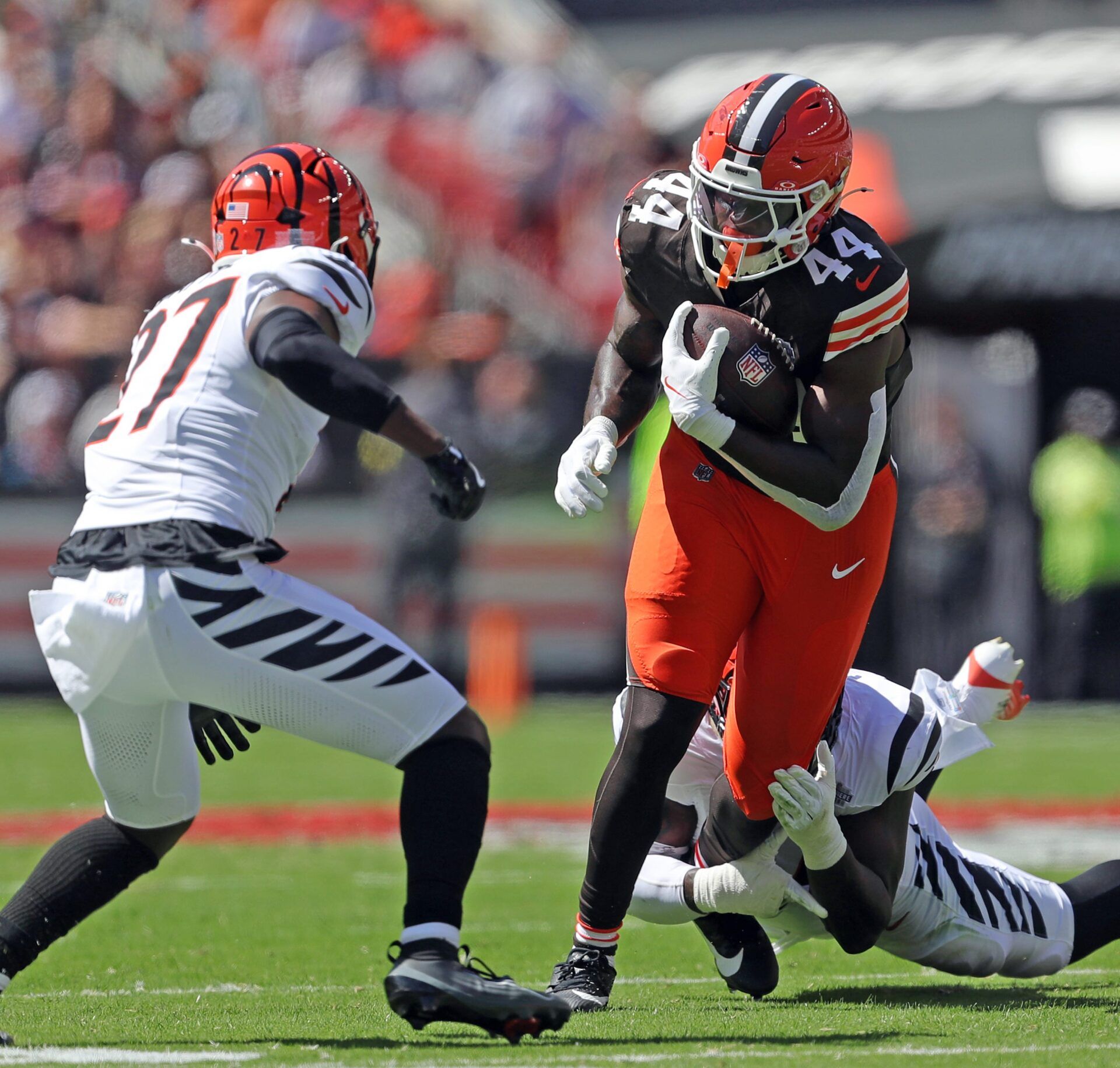 Browns tight end Harold Fannin Jr. drags a Cincinnati Bengals defender as he runs after a first-half catch, Sept. 7, 2025, in Cleveland.