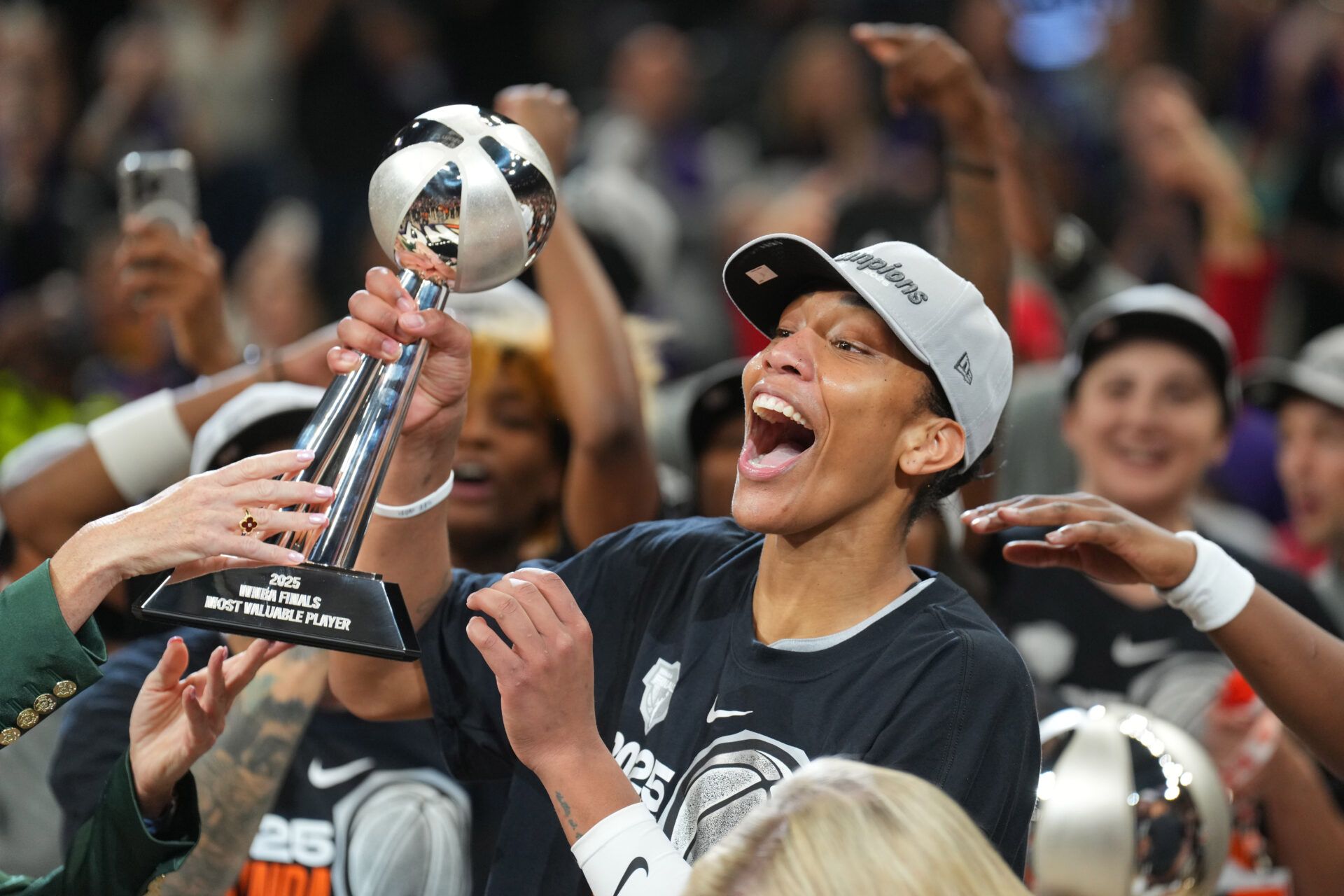 Las Vegas Aces center A'ja Wilson (22) celebrates with teammates after game four of the 2025 WNBA Finals at Mortgage Matchup Center.