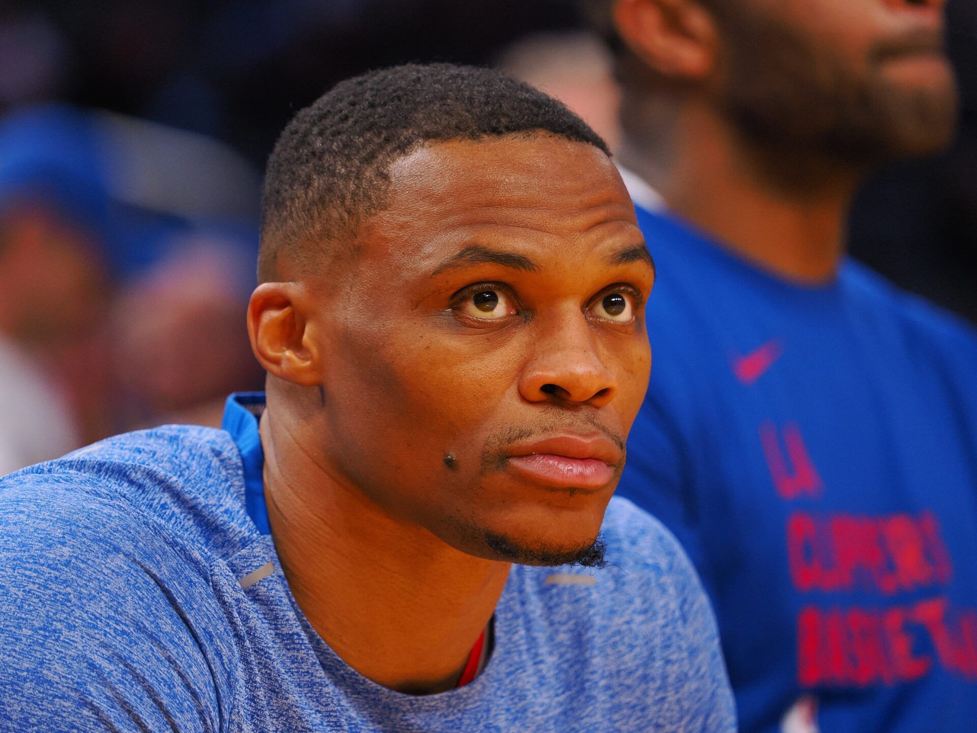 Los Angeles Clippers guard Russell Westbrook (0) sits on the bench before the game against the Golden State Warriors at Chase Center.