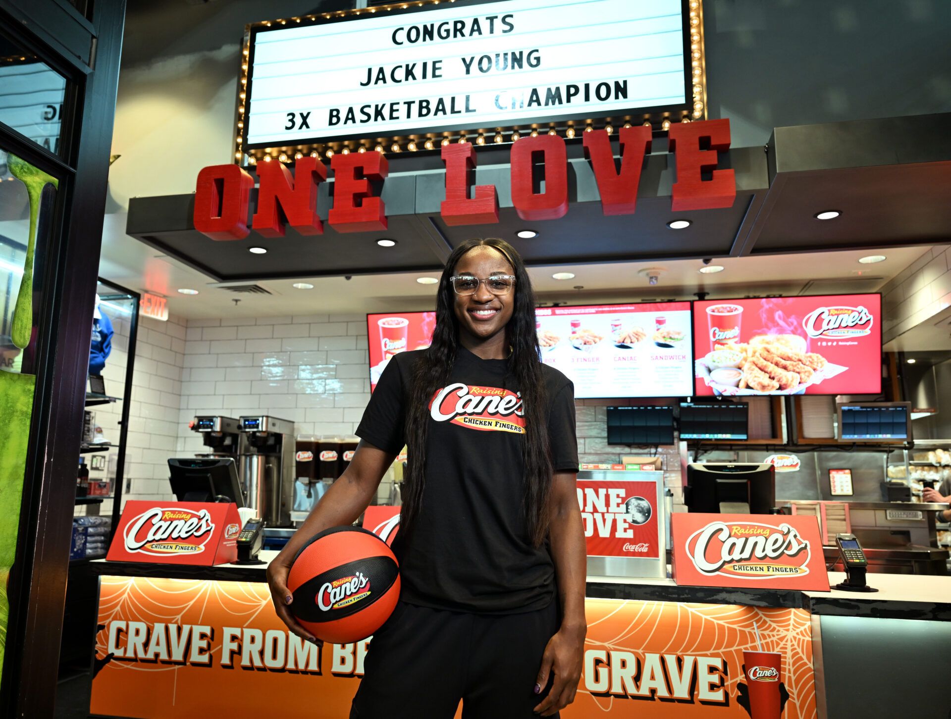LAS VEGAS, NEVADA - OCTOBER 14: Las Vegas Aces WNBA champion Jackie Young attends as she works a celebratory 