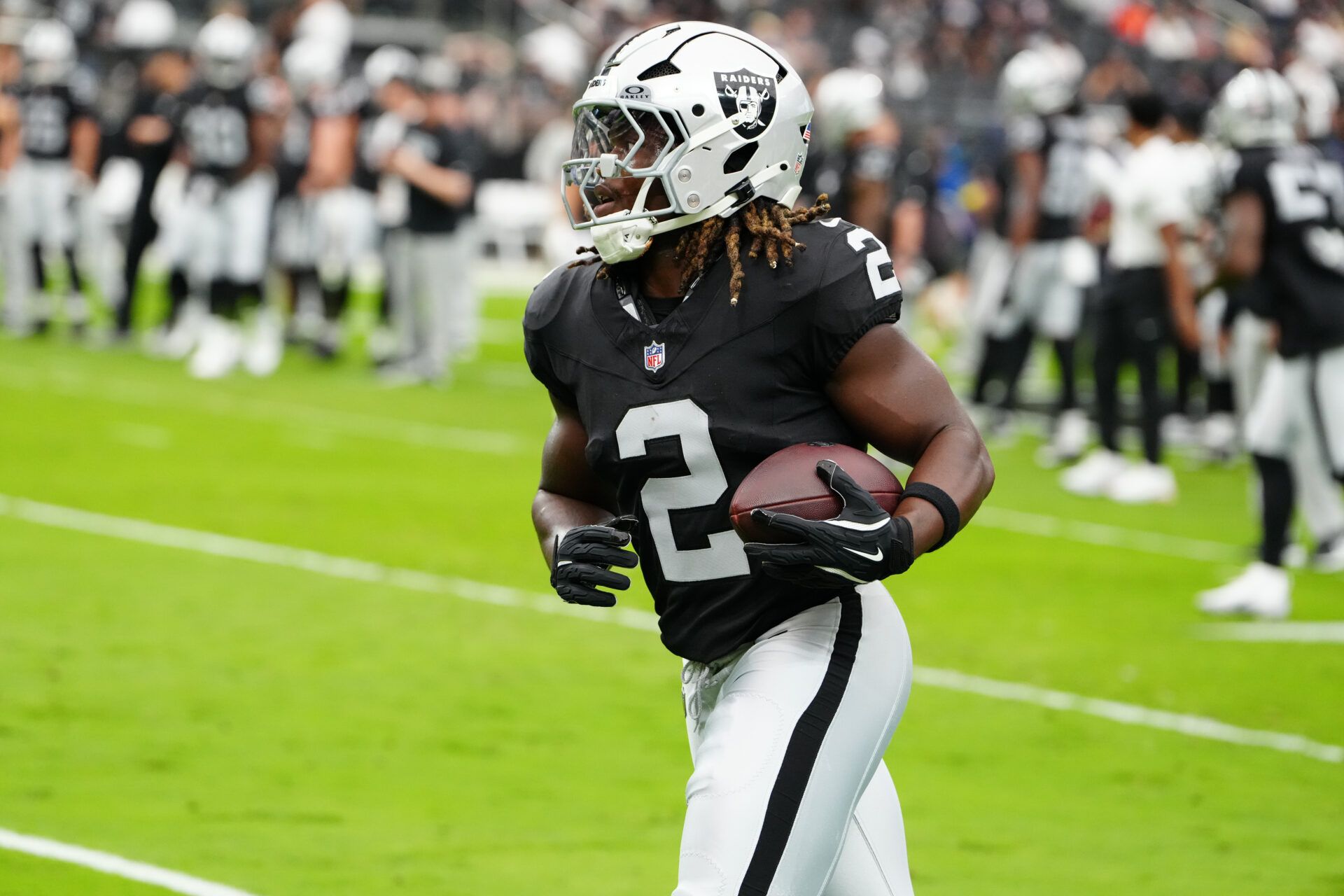 Las Vegas Raiders running back Ashton Jeanty (2) warms up prior to the game against the Chicago Bears at Allegiant Stadium.