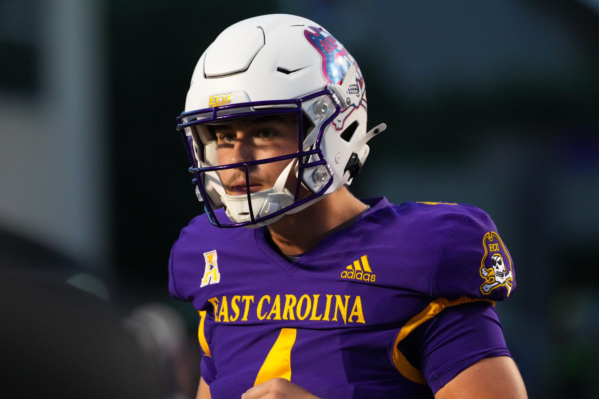 East Carolina Pirates quarterback Katin Houser (4) looks on during the warmups before the game against the Army Black Knights at Dowdy-Ficklen Stadium.