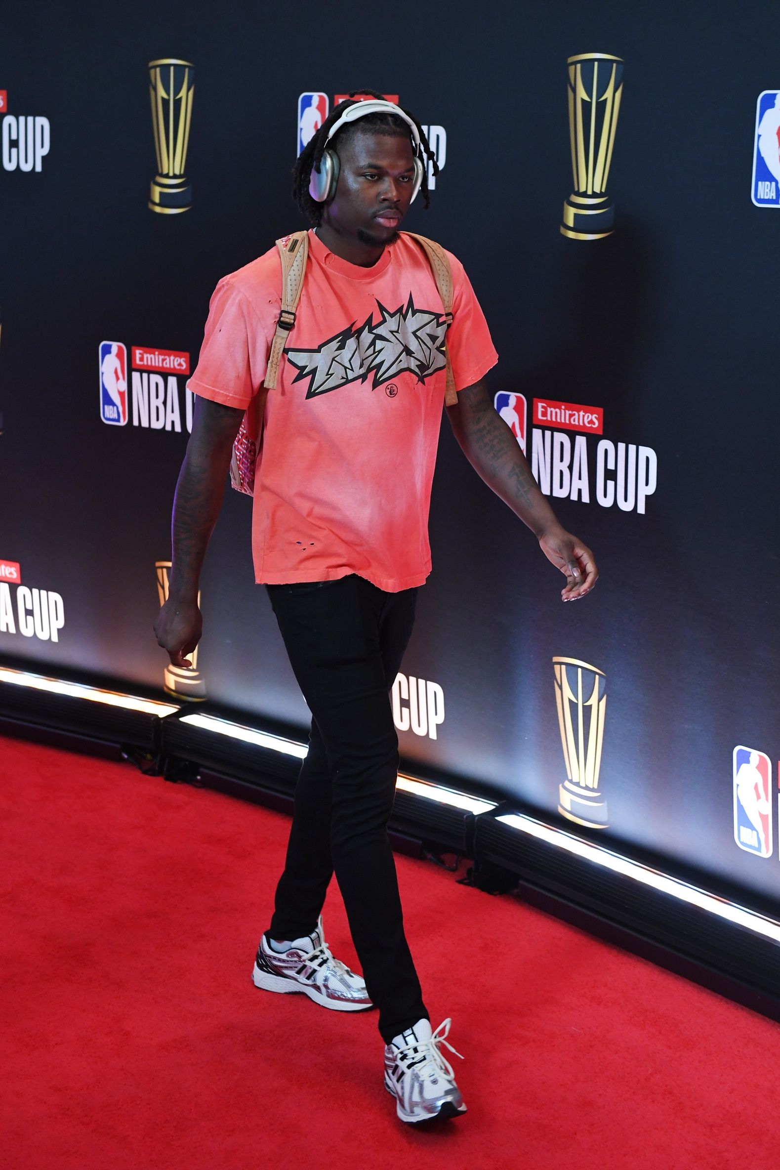 Milwaukee Bucks forward Chris Livingston (7) arrives on the red carpet before the Emirates NBA Cup semifinal game at T-Mobile Arena.