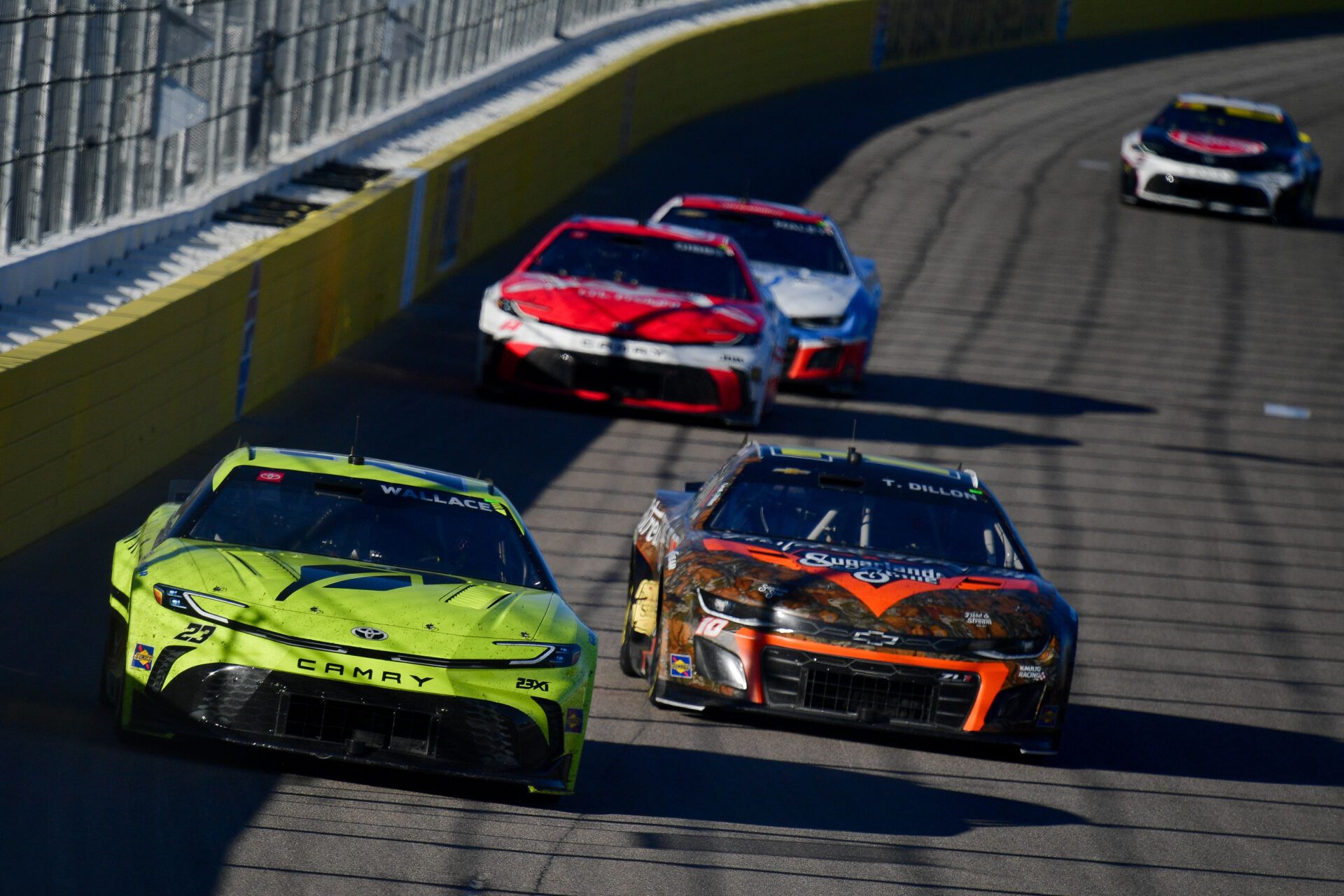 NASCAR Cup Series driver Bubba Wallace (23) leads driver Ty Dillon (10) during the South Point 400 at Las Vegas Motor Speedway.