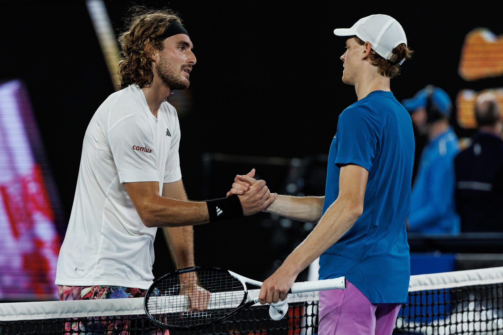 Melbourne, Victoria, Australia;  Stefanos Tsitsipas of Greece shakes hands with Jannik Sinner of Italy after beating him on day seven of the 2023 Australian Open tennis tournament at Melbourne Park.