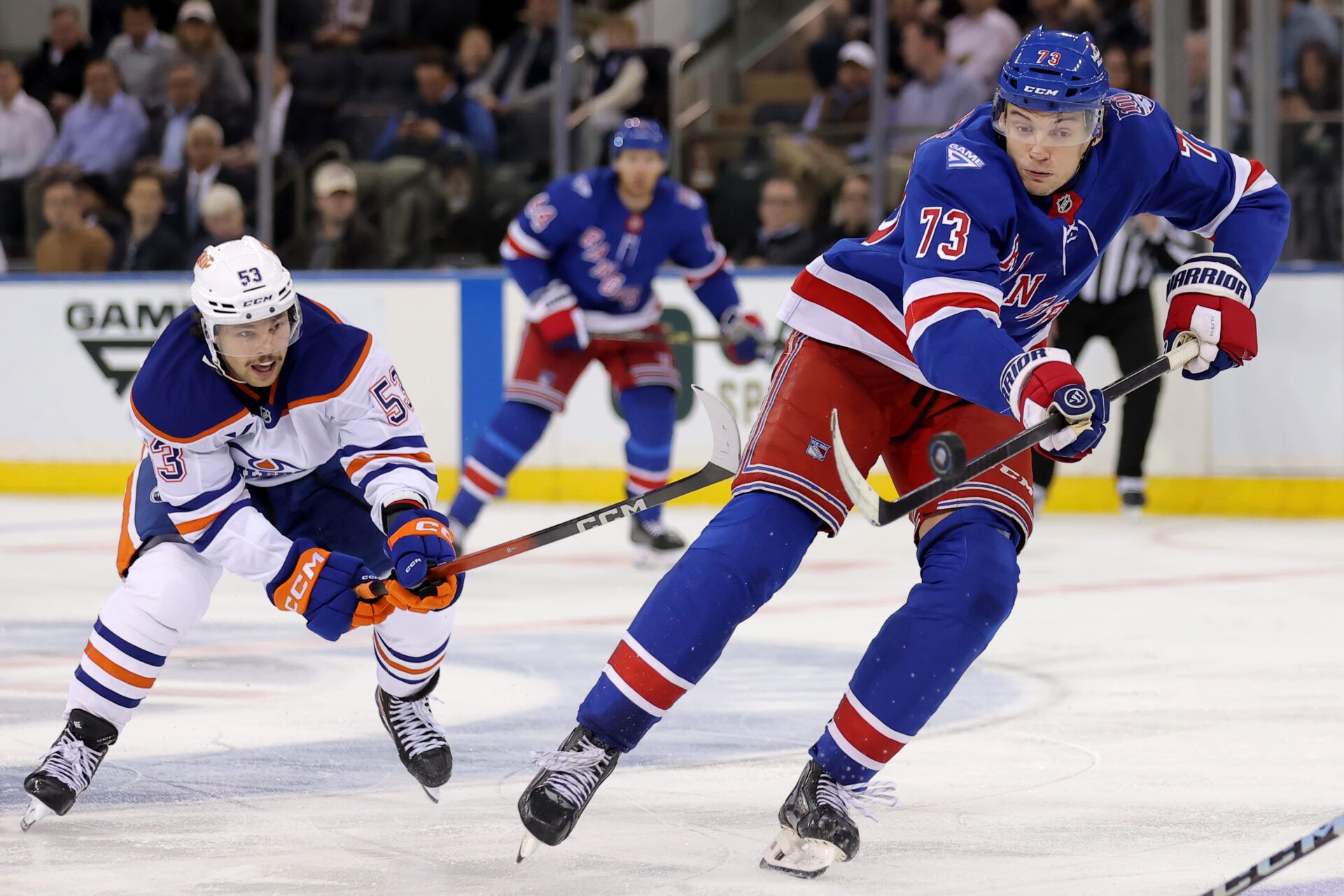 New York Rangers center Matt Rempe (73) plays the puck against Edmonton Oilers left wing Isaac Howard (53) during the third period at Madison Square Garden.
