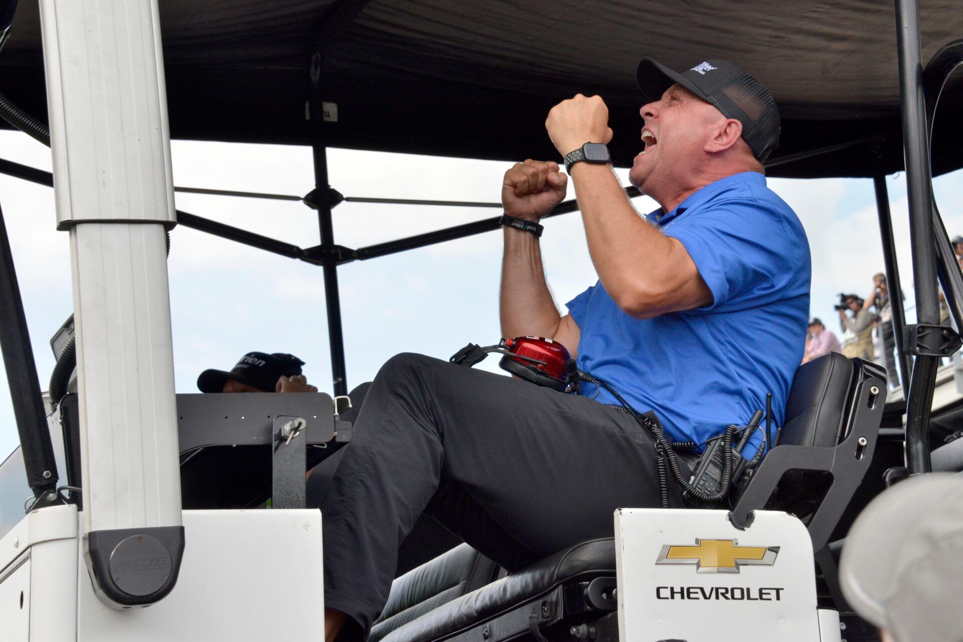 Kaulig Racing president Chris Rice celebrates in the pit box as NASCAR Xfinity Series driver AJ Allmendinger (16) crosses the finish line in first place Saturday, July 30, 2022, during the Pennzoil 150 at the Brickyard at Indianapolis Motor Speedway.