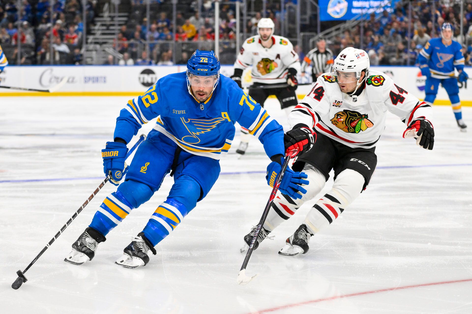 St. Louis Blues defenseman Justin Faulk (72) controls the puck as Chicago Blackhawks defenseman Wyatt Kaiser (44) defends during the third period at Enterprise Center.